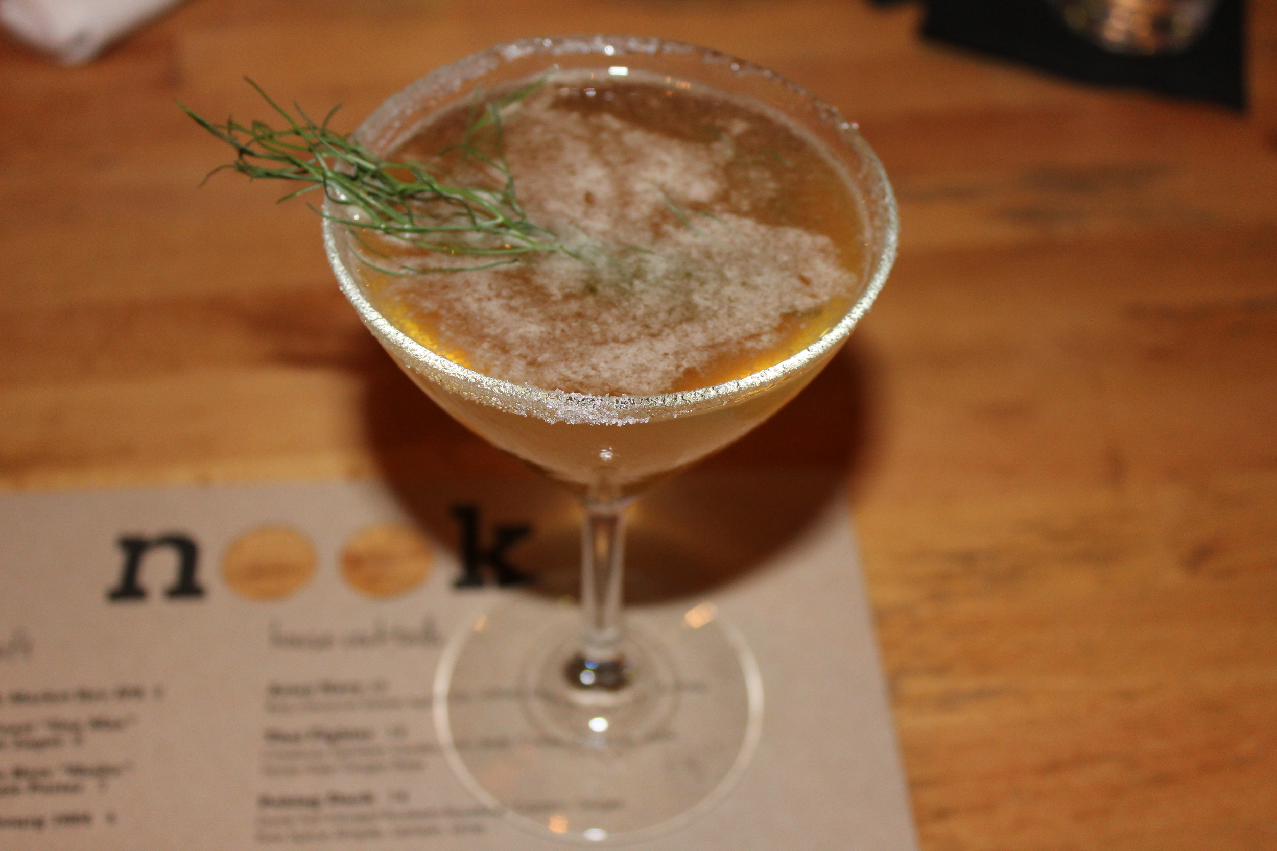 Seasonal Sidecar (H by Hine cognac, Yellow Chartreuse, carrot simple syrup, and lemon)