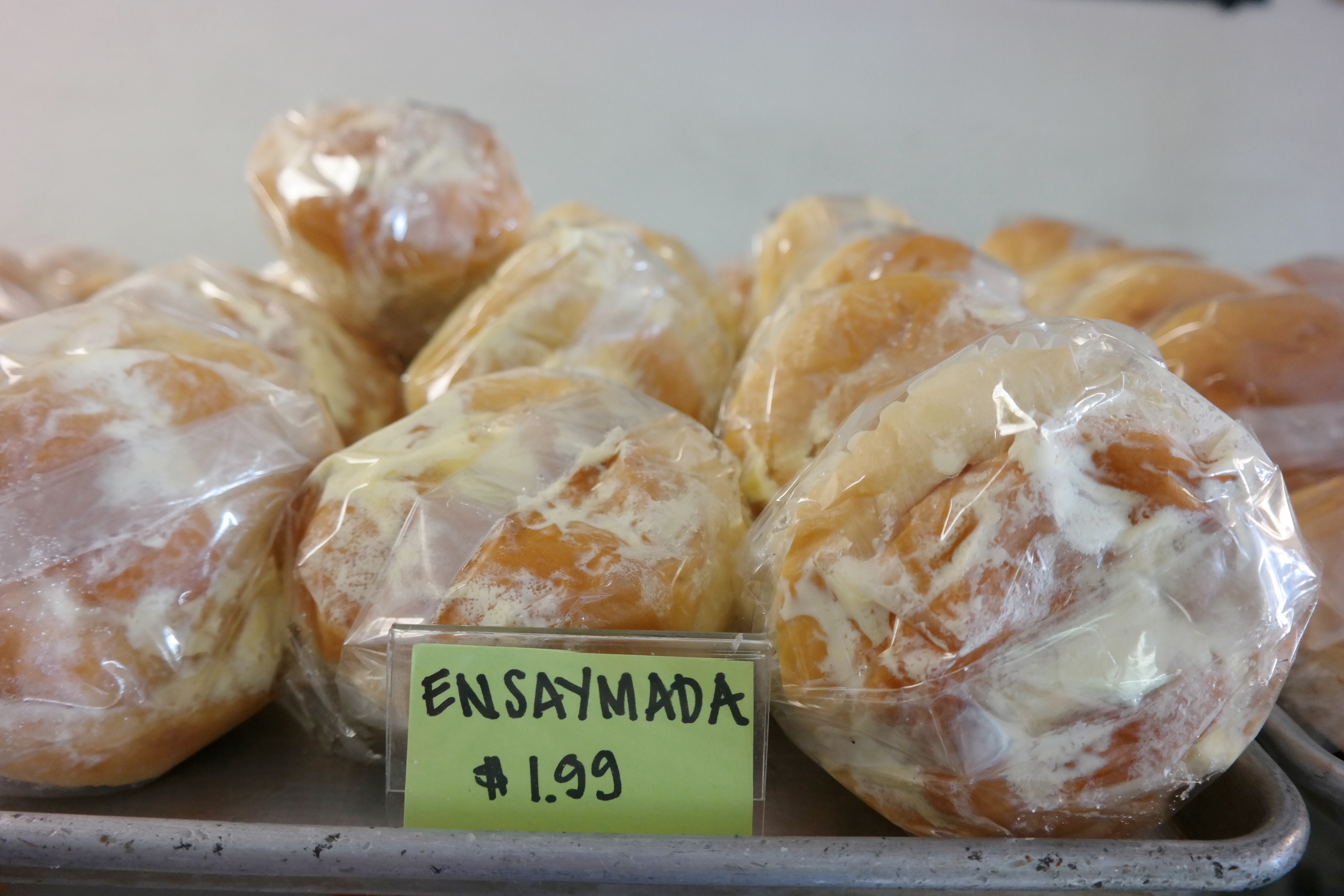 Sweet buns topped with whipped butter, cheese, and sugar