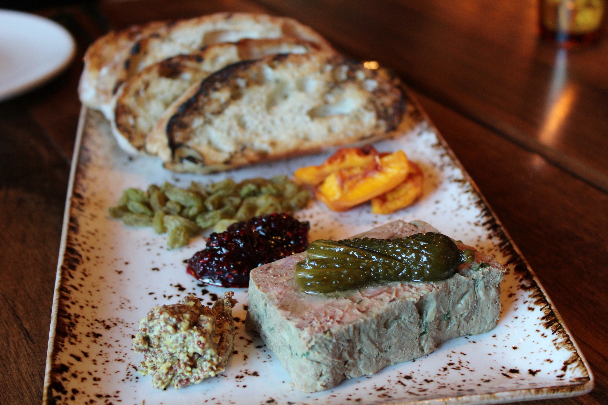 Chicken liver & bacon country pâté with dried fruit, housemade jam, mustard, cornichons, and grilled bread