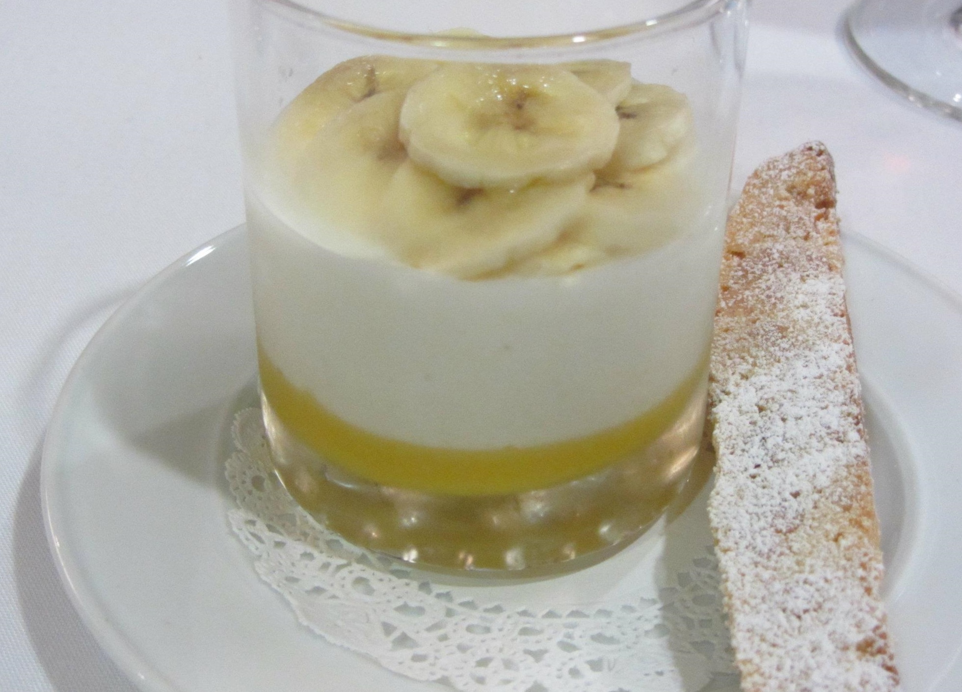 Panna cotta with passionfruit curd and banana-macadamia biscotto