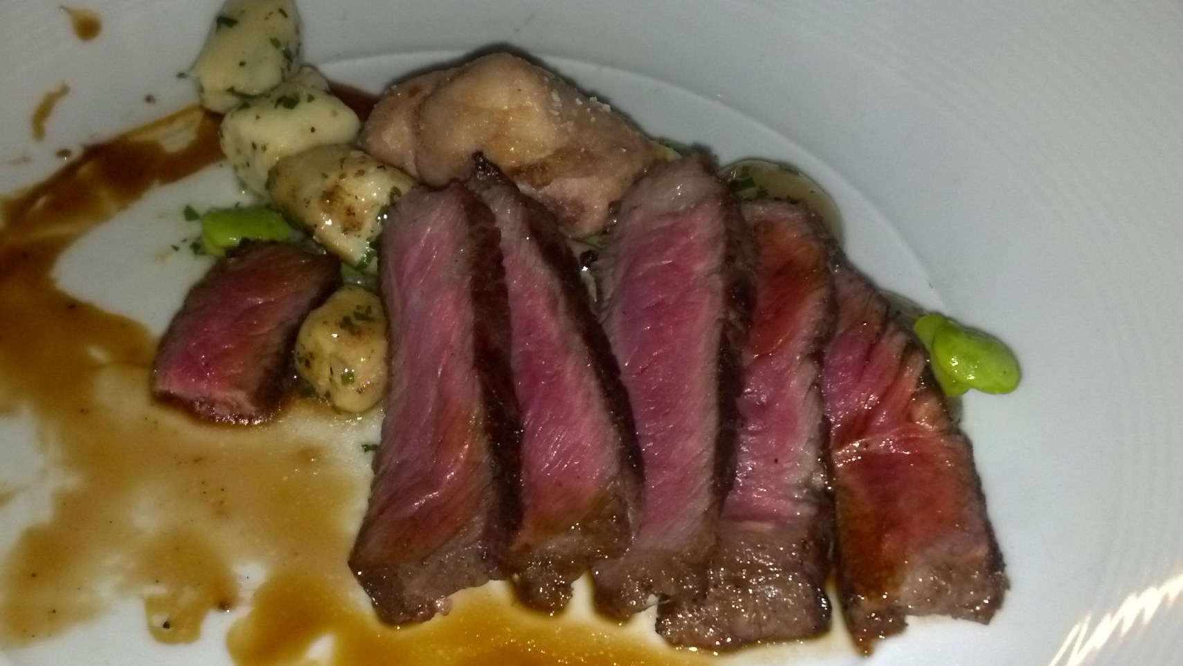 Dry-aged beef with gnocchi and vegetables