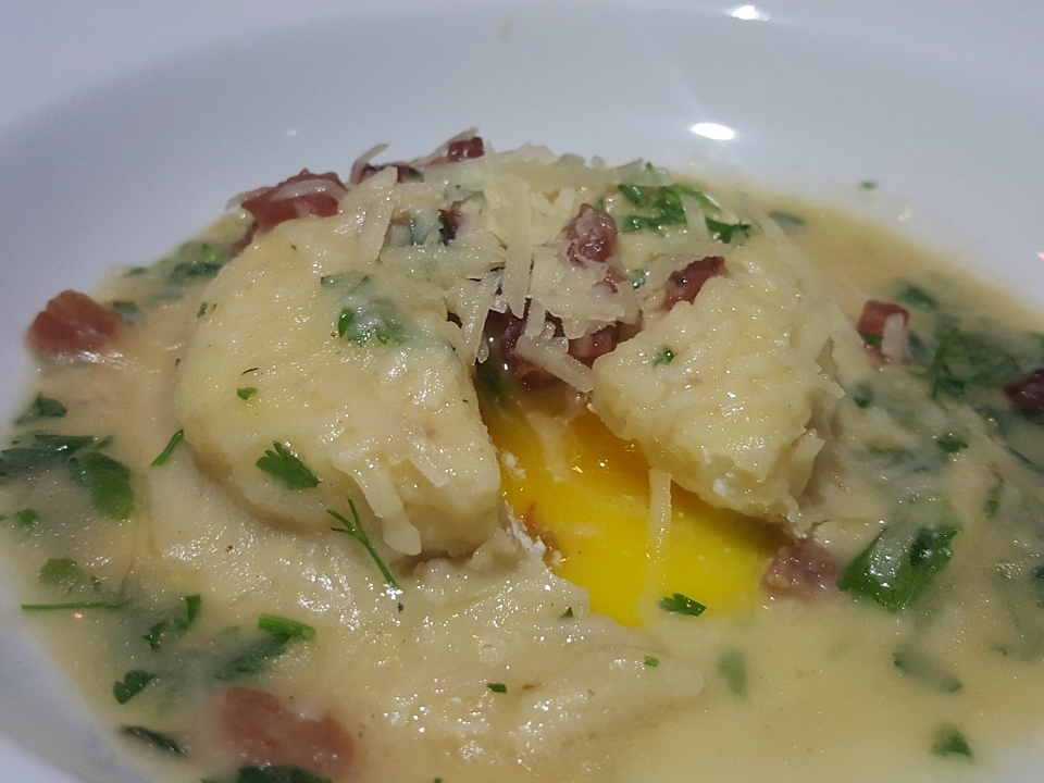 Raviolo with egg, truffle ricotta and brown butter