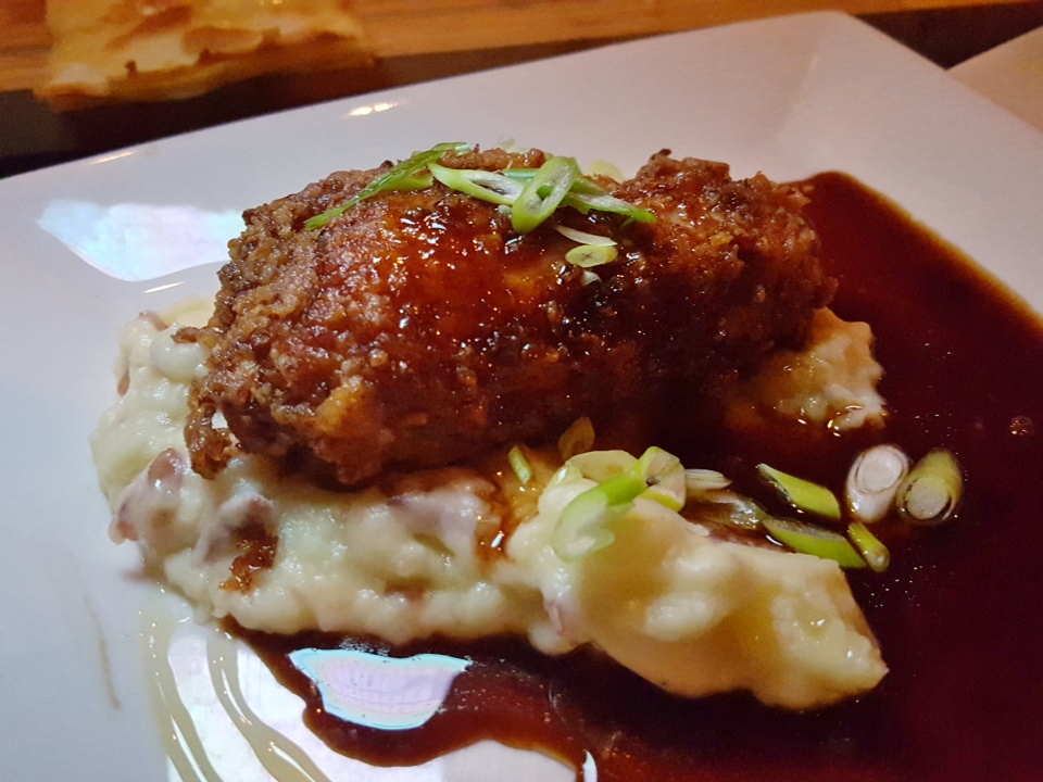 Crispy chicken thigh with olive oil mash and duck gravy