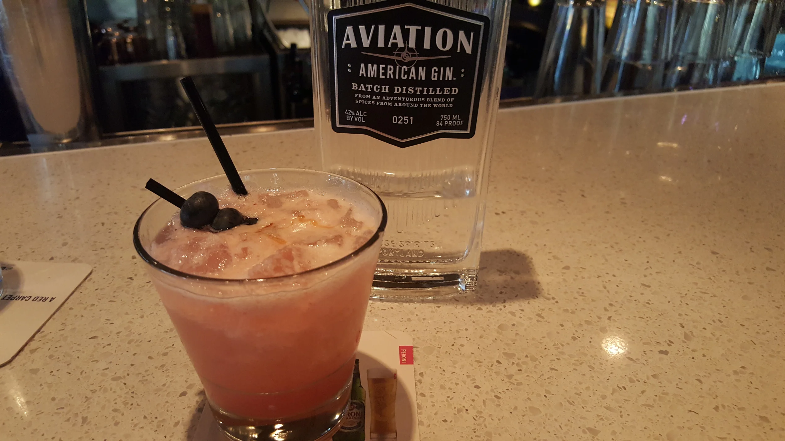 A Kris Korf creation with strawberries, blueberries, and gin.