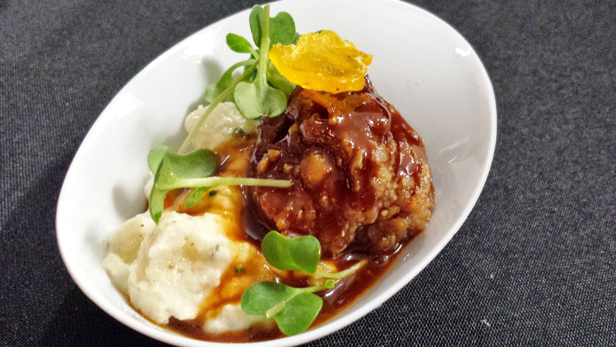 Top of the Rock and Chef Gregory's crispy chicken liver, creamed hominy and cured egg yolk