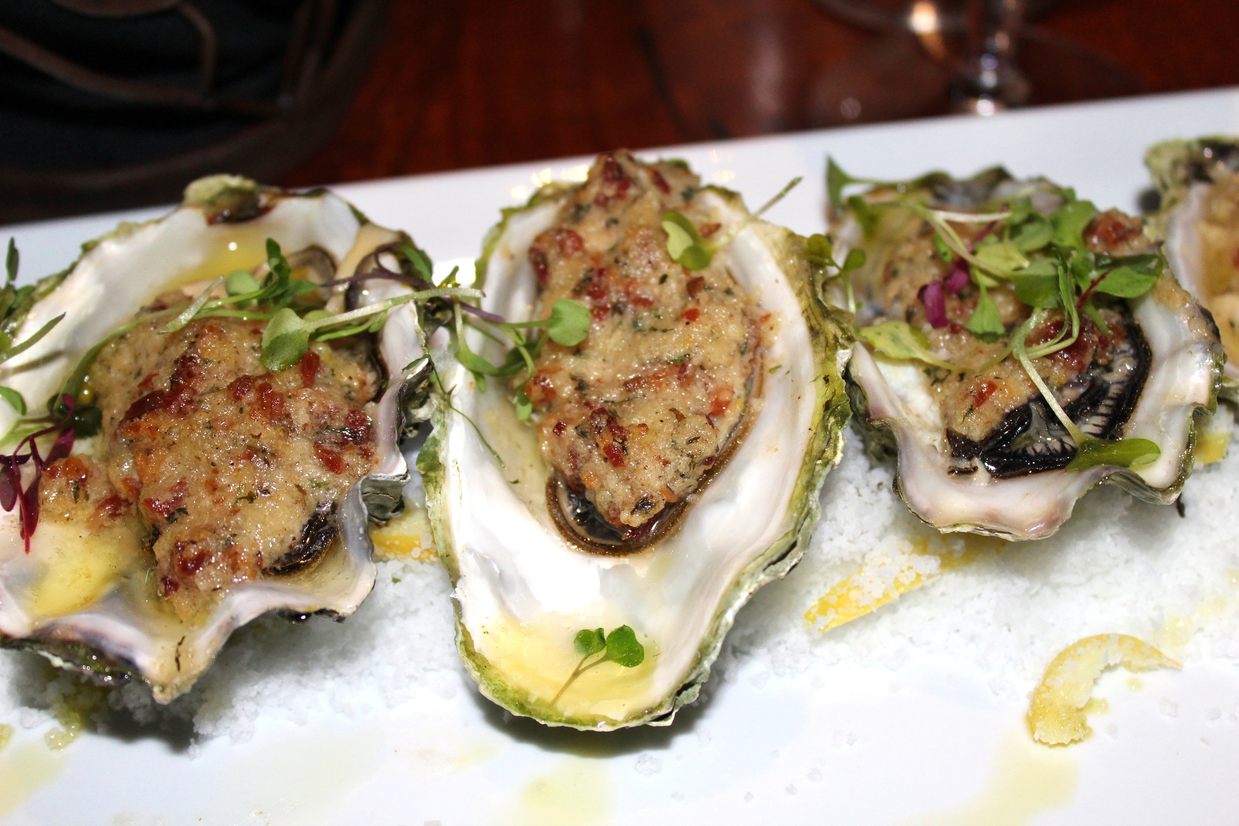 Chef Creek Oysters, bacon-horseradish-chervil butter and lemon oil. 