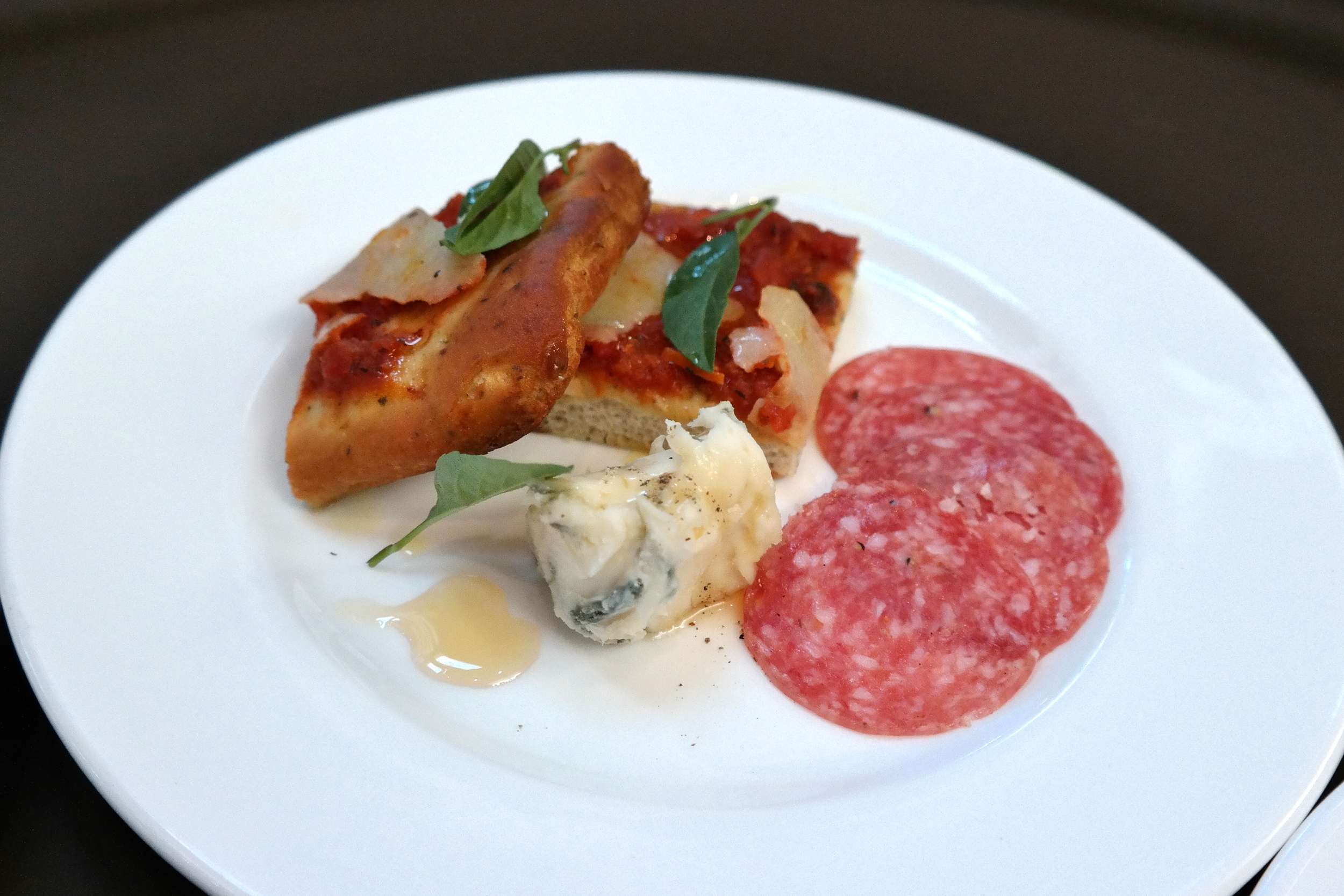 Pizzetta, salumini, and gorgonzola dolce with honey.