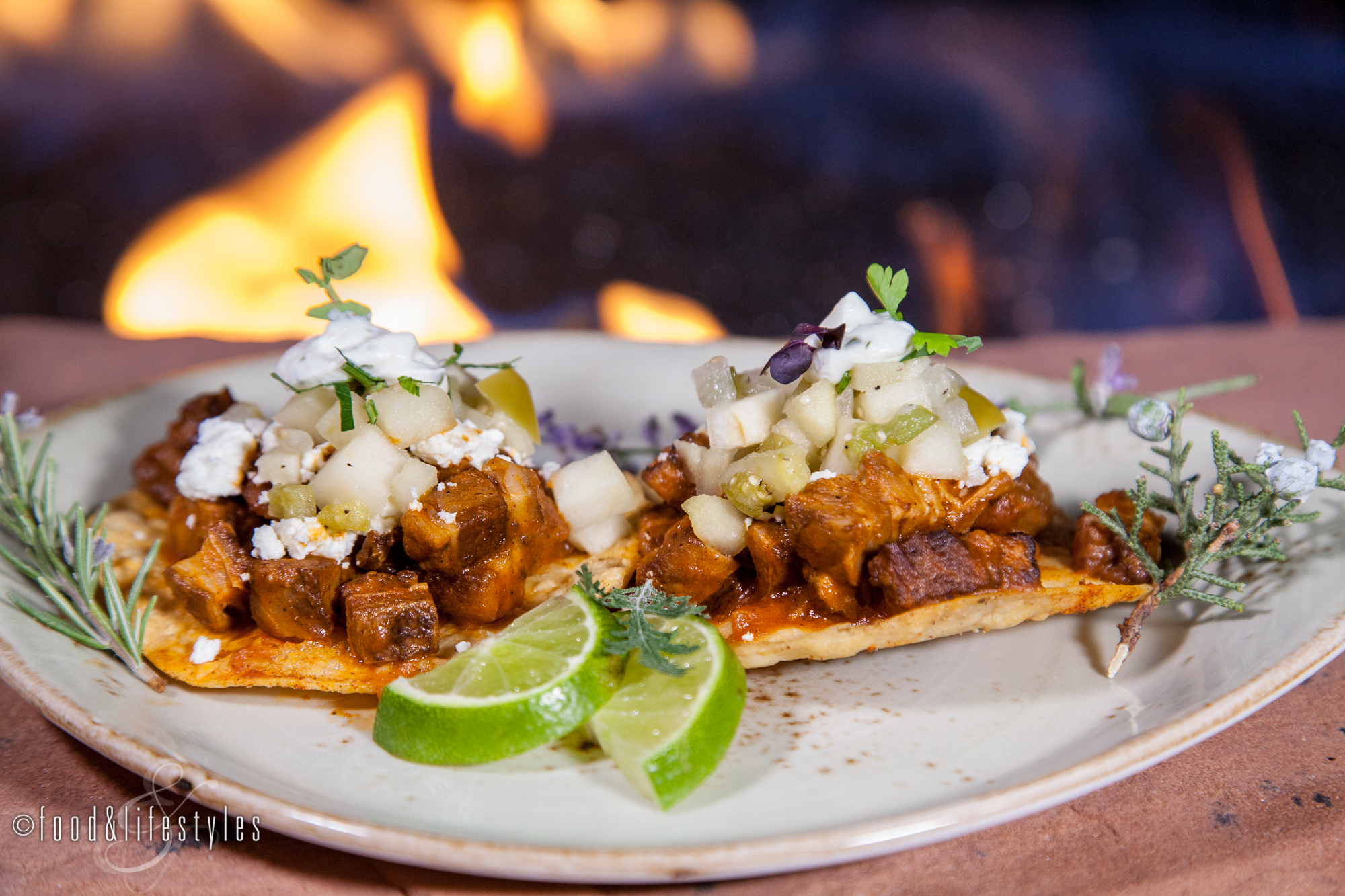 Lamb tostadas with smoked goat cheese and tomatill0-apple salsa 