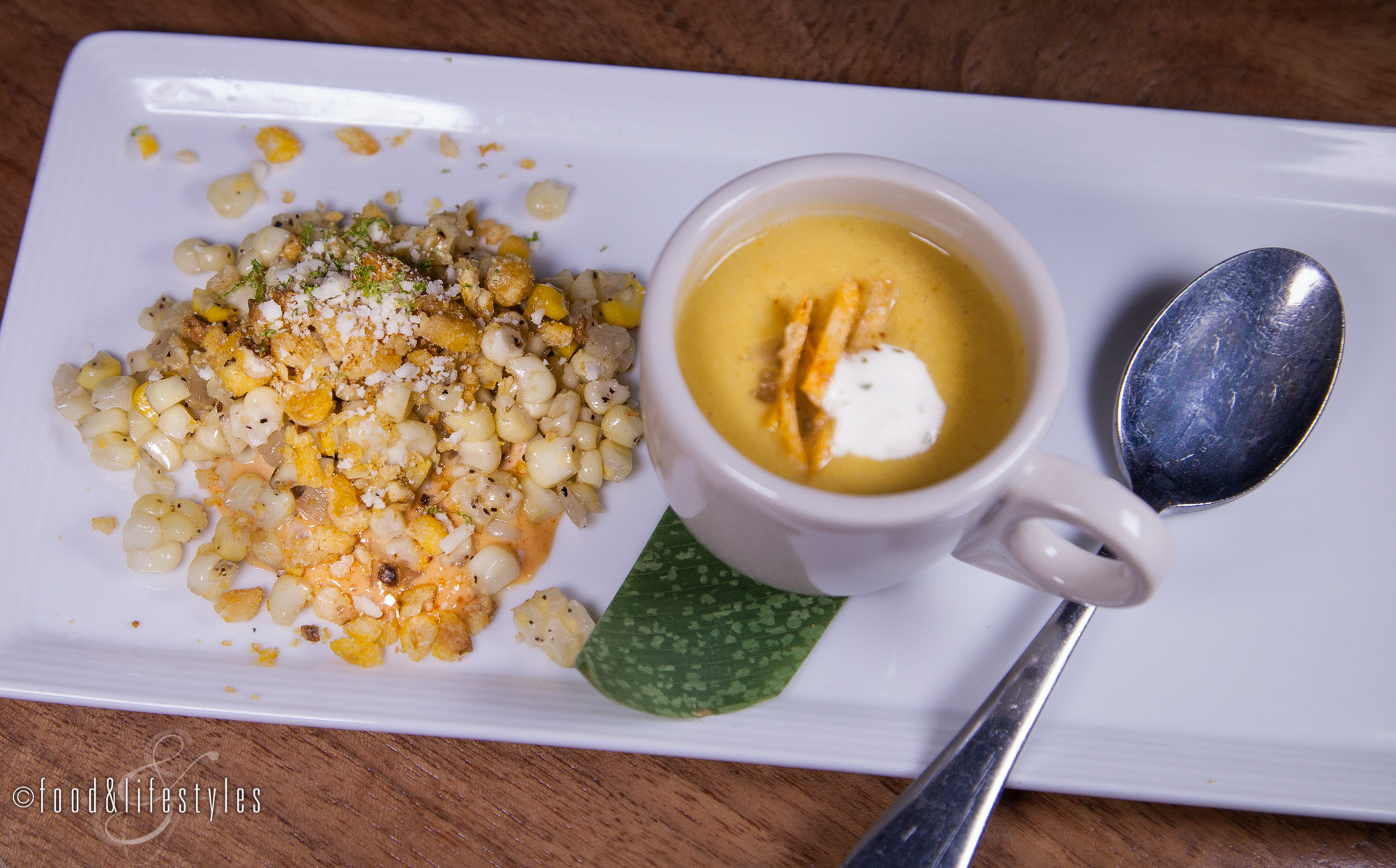 Roasted corn soup with cilantro crème and grilled corn with lime and cotija cheese