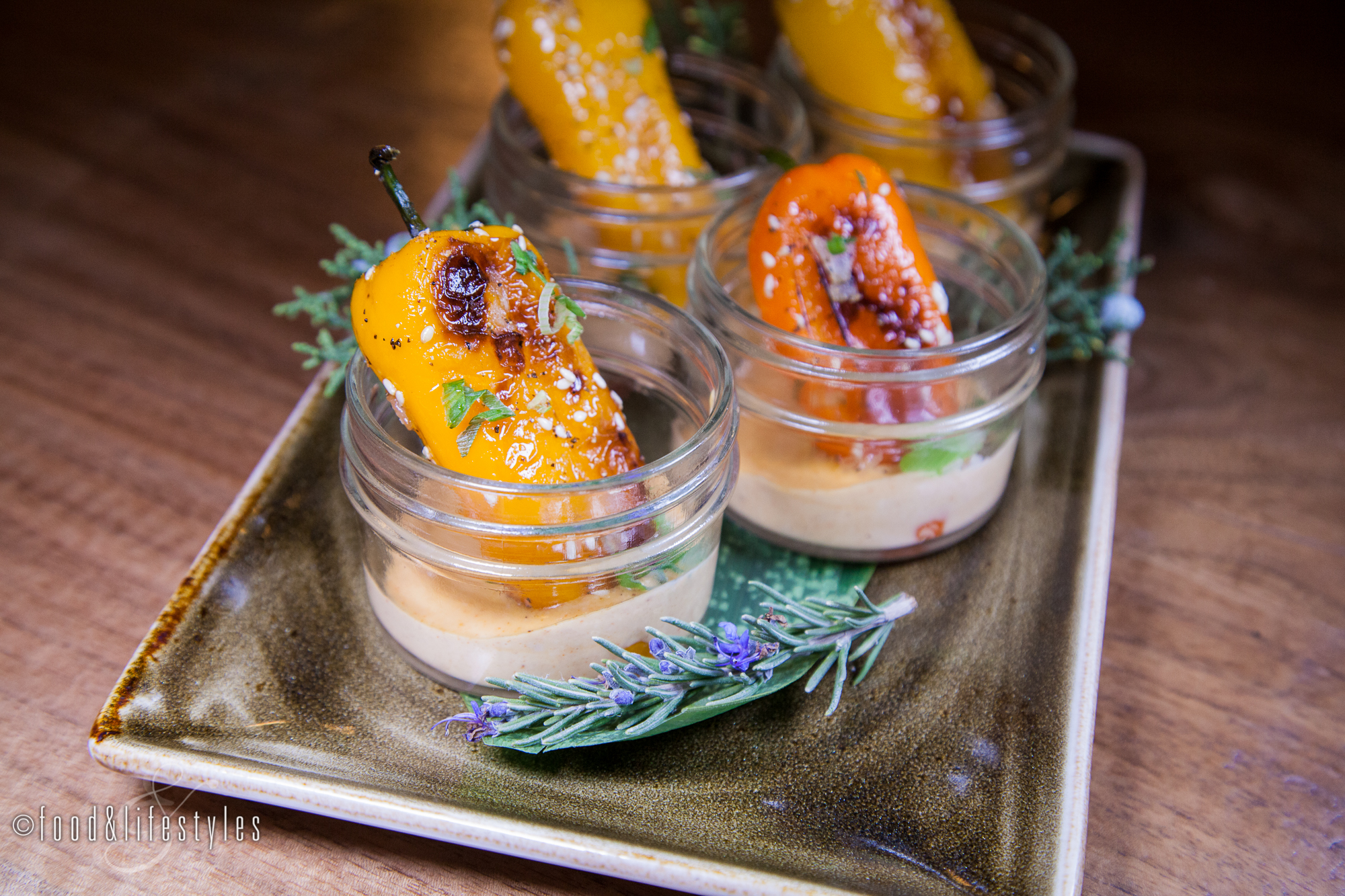 Roasted mini-bell peppers with chipotle aioli, scallion, and sesame