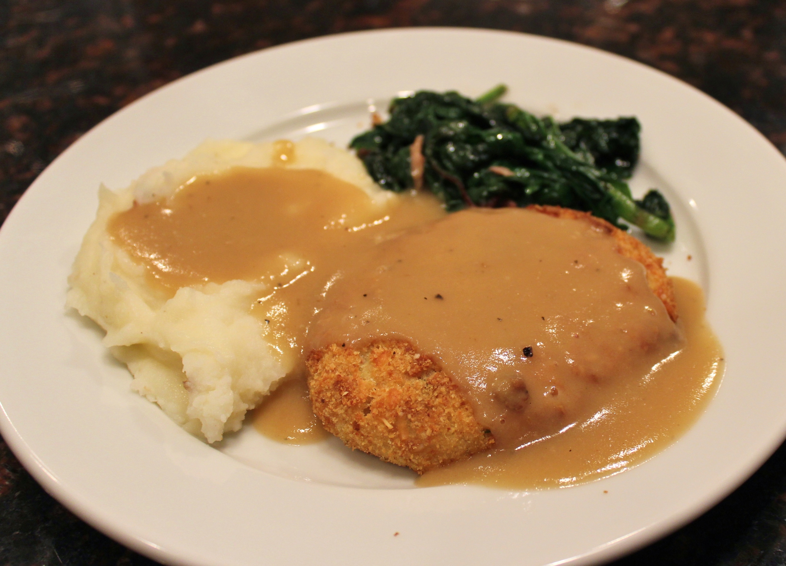 Chicken croquettes with mashed potatoes and spinach from the garden