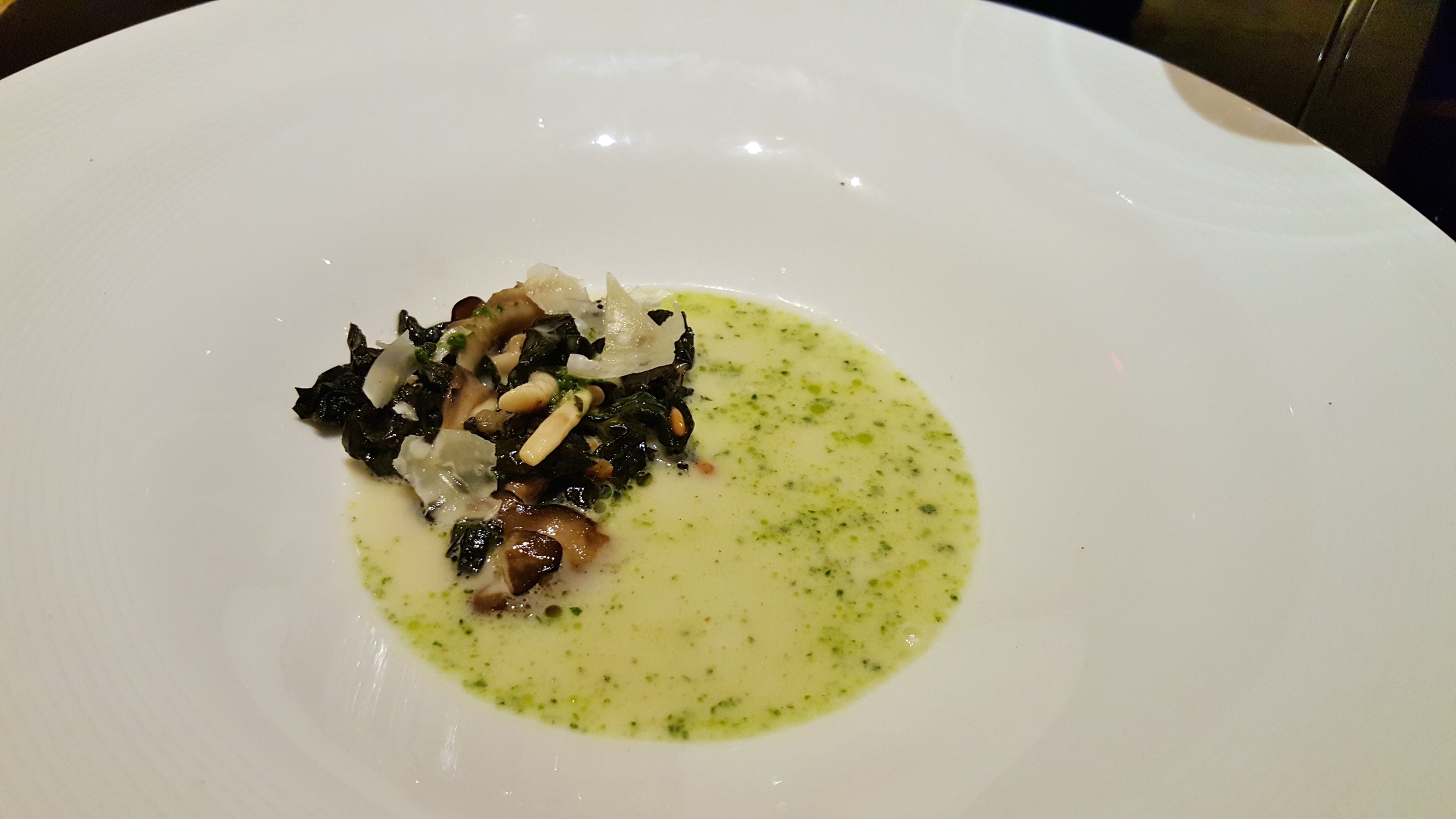 Miso-parmesan broth with kale-basil pesto and wild mushrooms