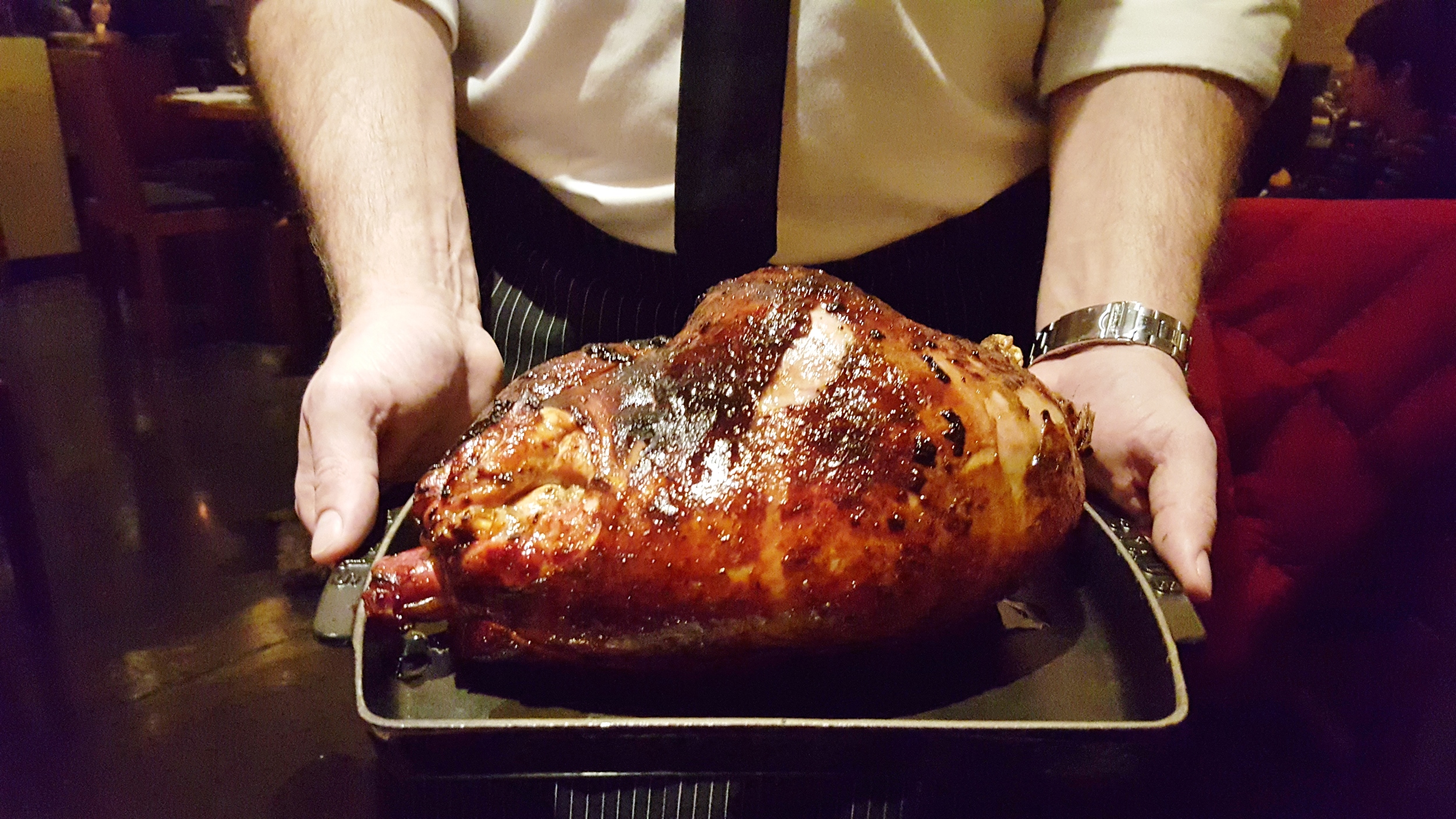 Guinea hen roasted and glazed with sorghum and whiskey