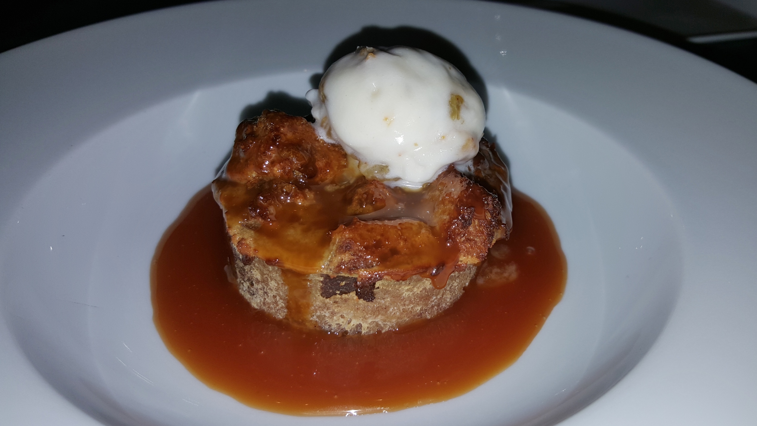 Sticky toffee cake with caramel sauce and frozen yogurt 