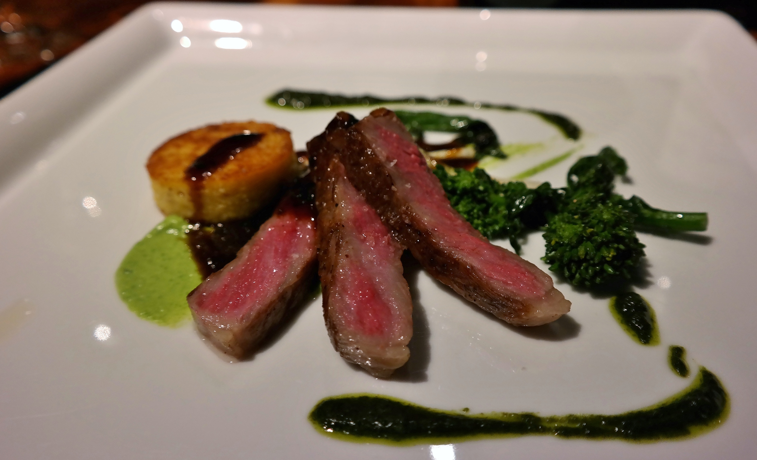 Kobe beef with rapini and truffle demi-glace