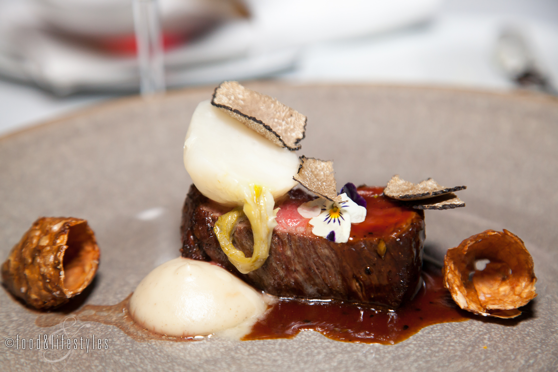 Dry-aged stripsteak with sunchokes and truffles