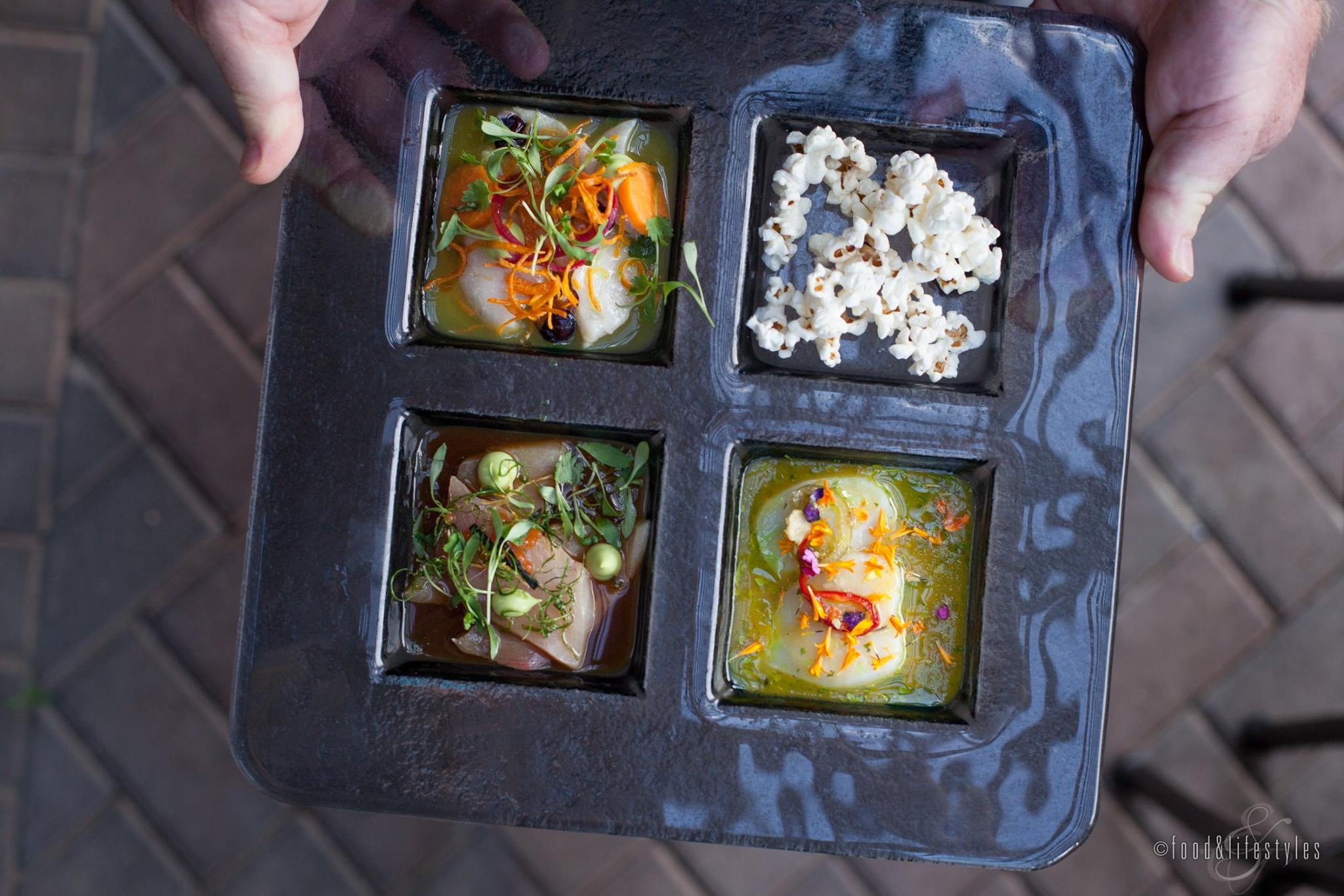 Ceviche trio with nitro popcorn at Deseo