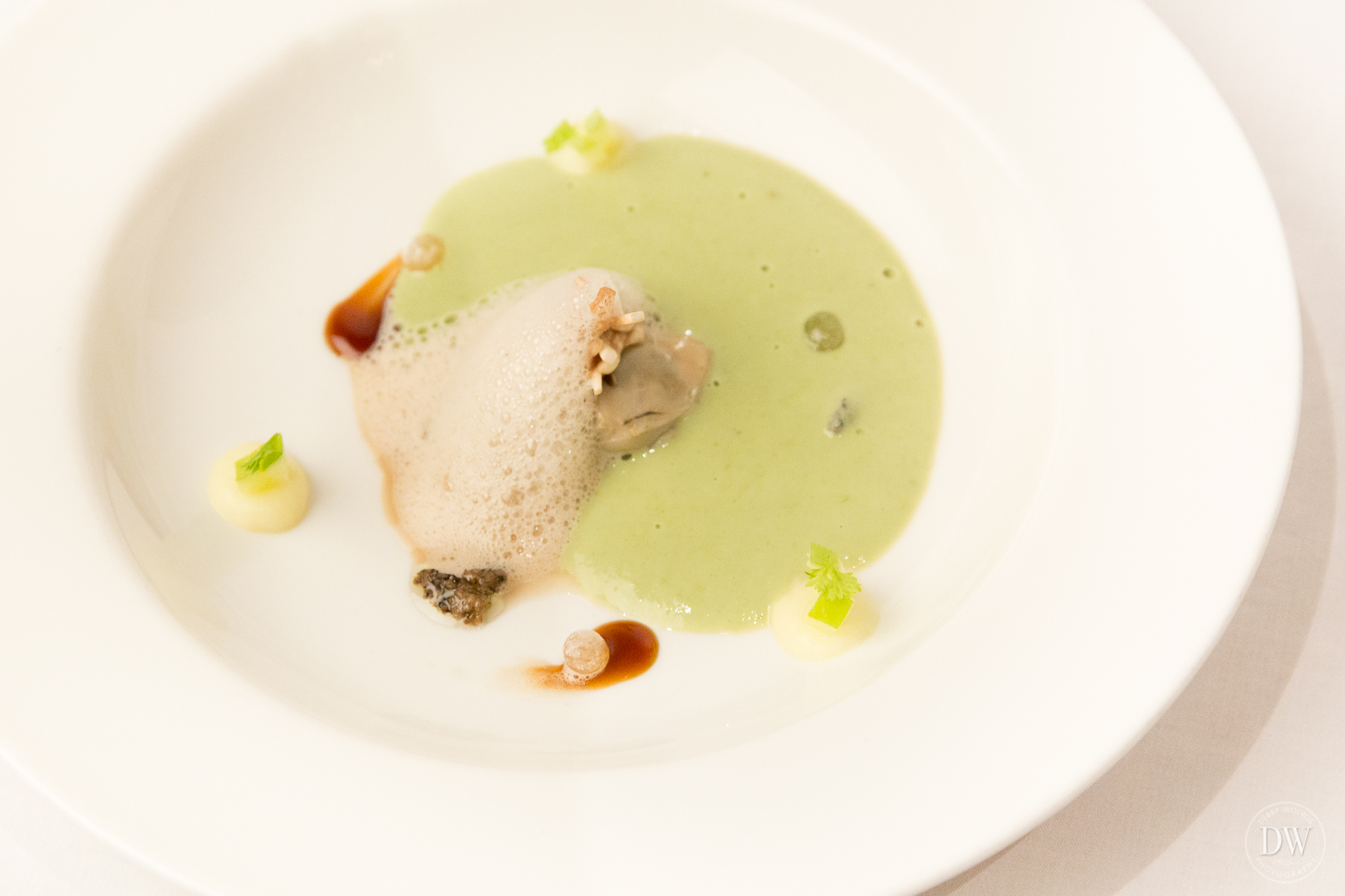 Oyster with iodine sauce, green apple and mushroom foam