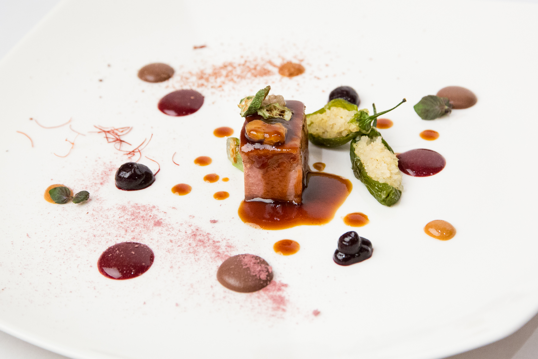 Veal with quinoa-stuffed peppers and blueberries