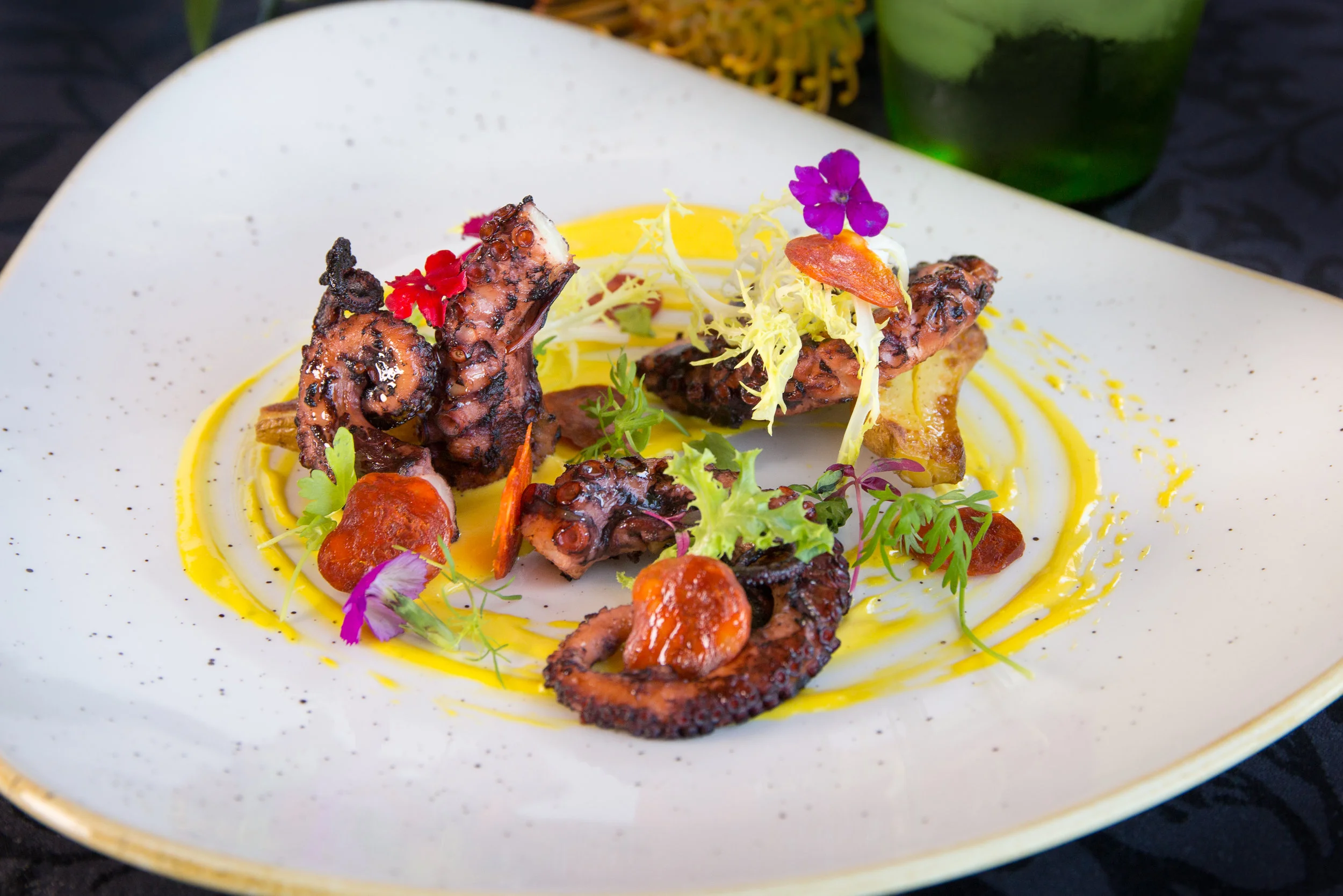 Octopus with chorizo, confit potatoes, and aji amarillo 