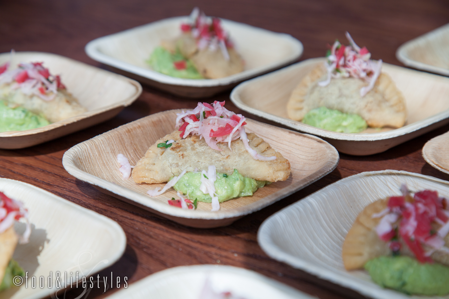 Sierra Bonita Grill: Short rib and wild mushroom empanada with guacamole and pickled red onion
