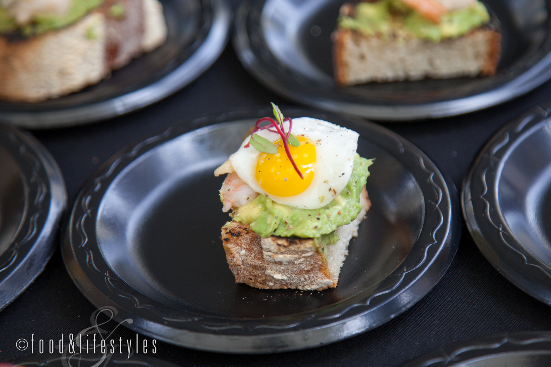 The Vig: Butter-poached shrimp on avocado toast with quail egg