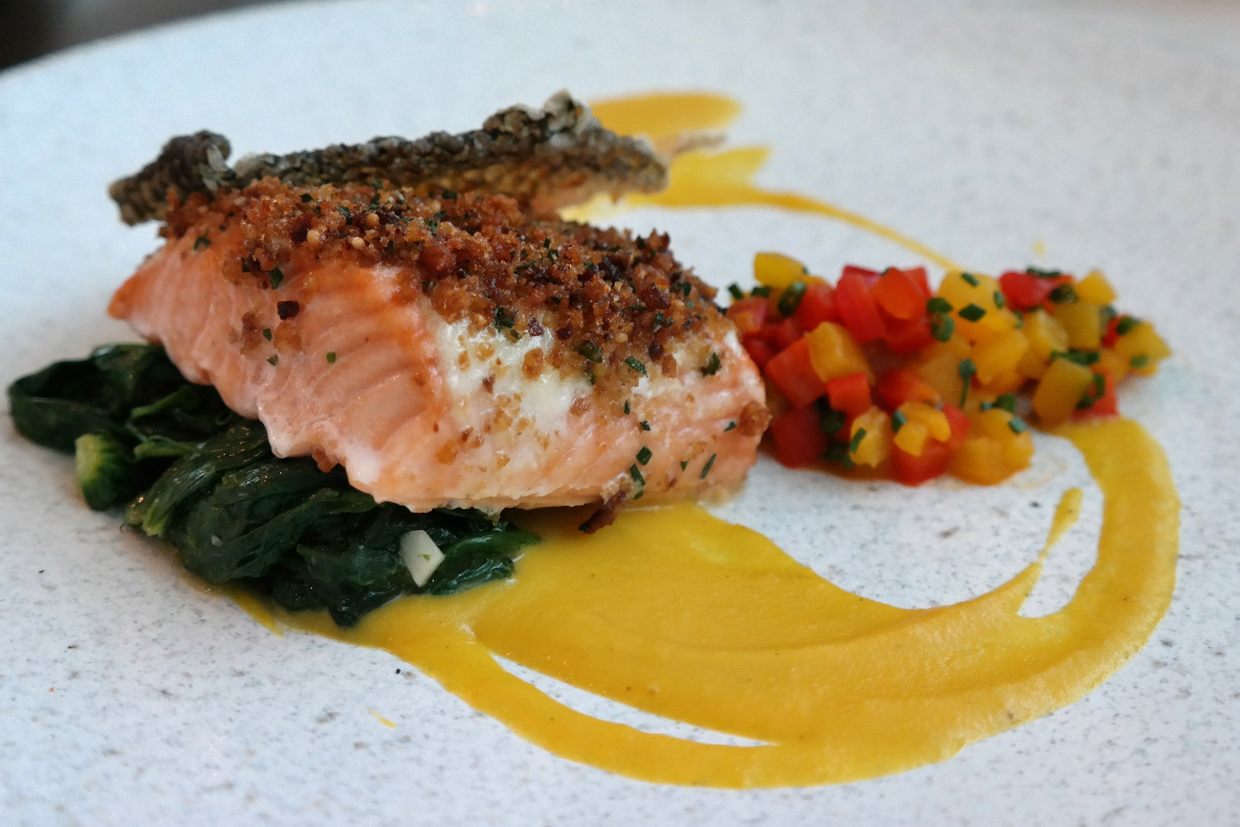 Ora king salmon, Noble millet gremolata, and golden pepper beurre blanc