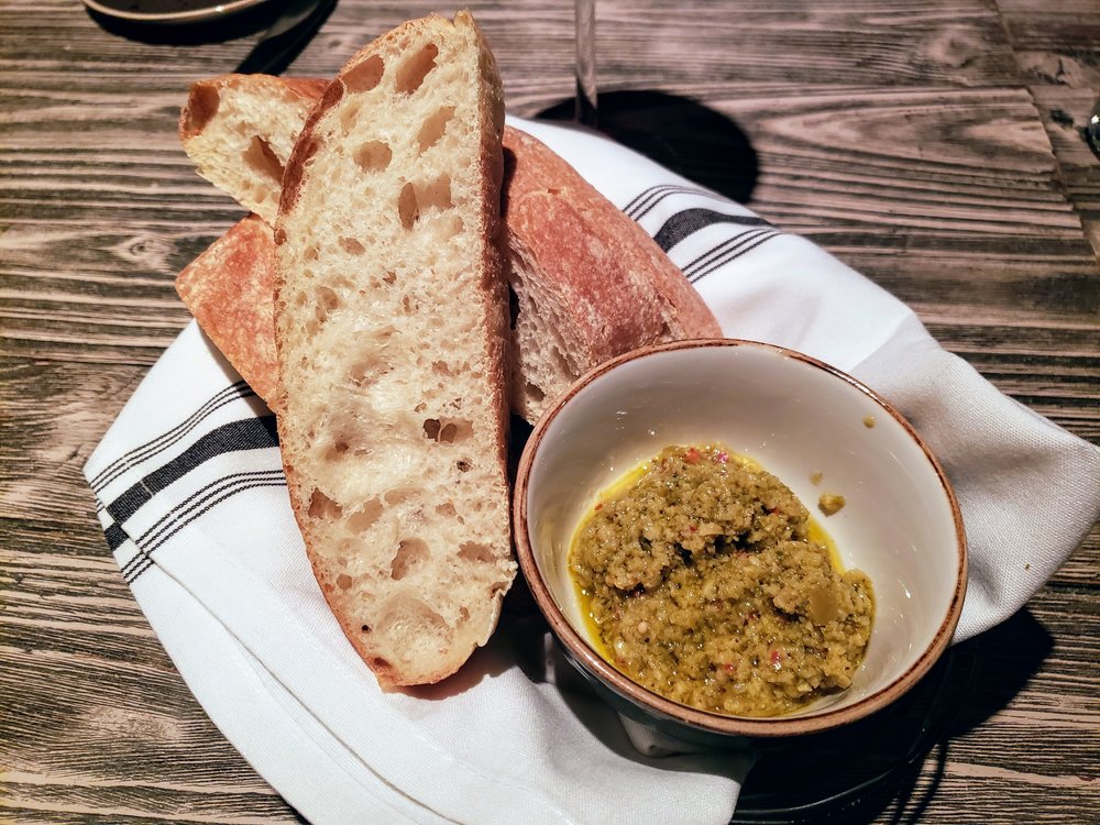 Bread and Calabrian chile and green olive tapenade