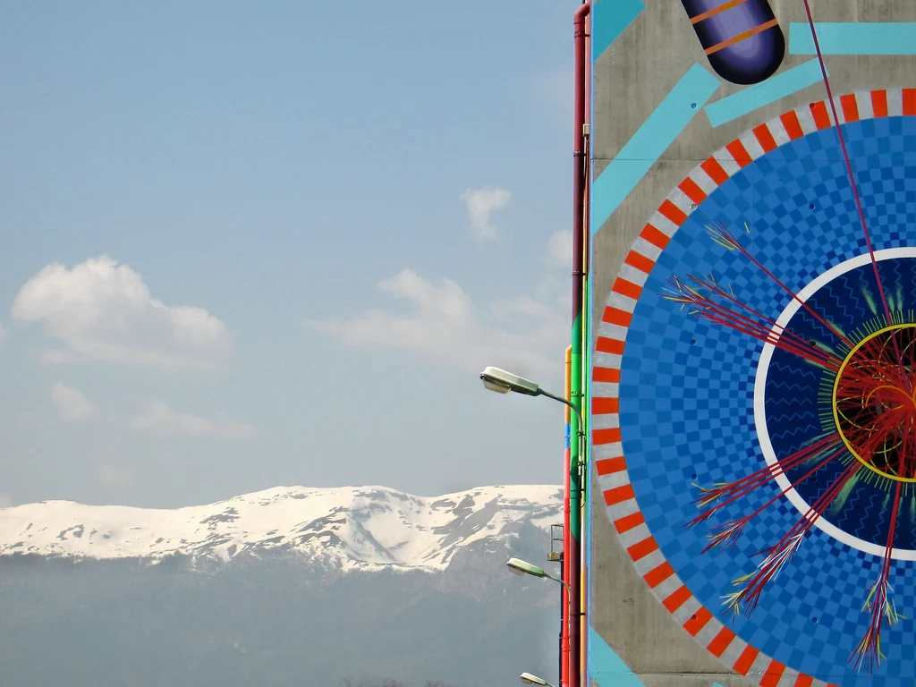 The Atlas Detector mural at CERN in Switzerland - Mountains