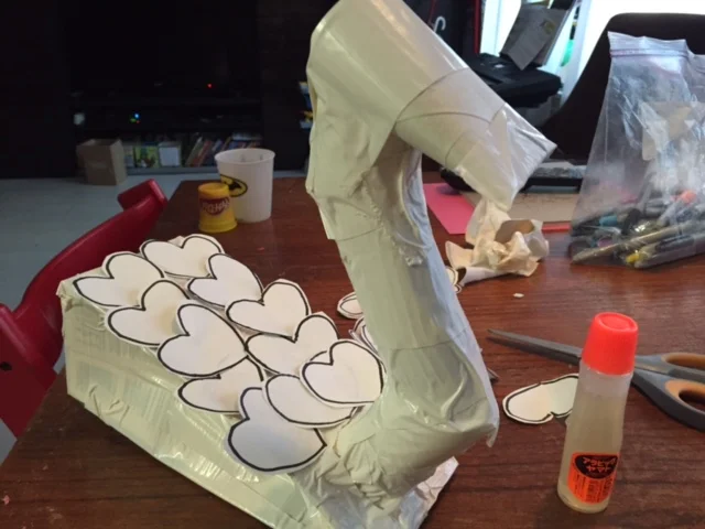 A few more cuts on the paper towel tube and some more duct tape got the neck looking better.