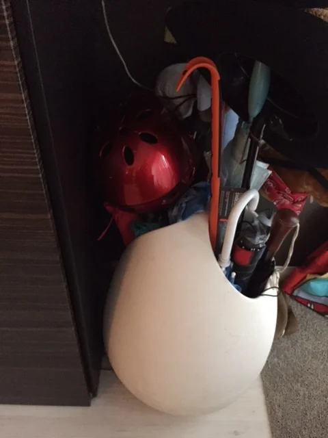 They'd have to lift up the red helmet to see him.