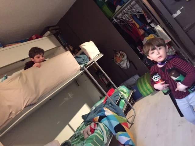 Their bunk bed was our spaceship. Lyric was loading it with supplies before we blasted off.