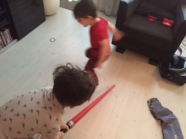 Lyric jumping over the lightsaber attack. Sweet ninja moves indeed.