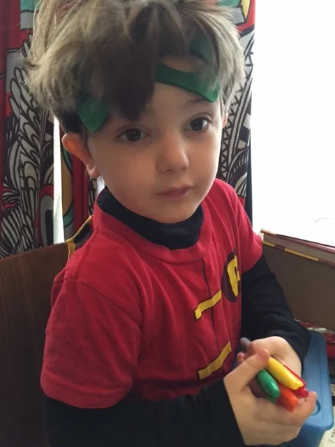 As Robin, natch.