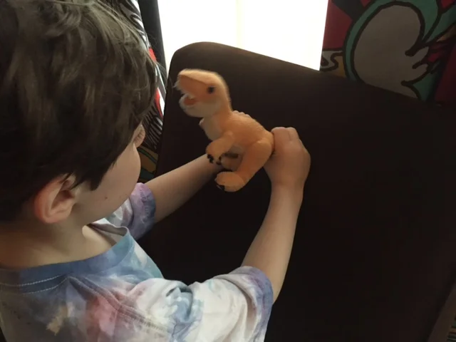 Principal Zephyr has a stern talking-to with Baby Dinosaur.