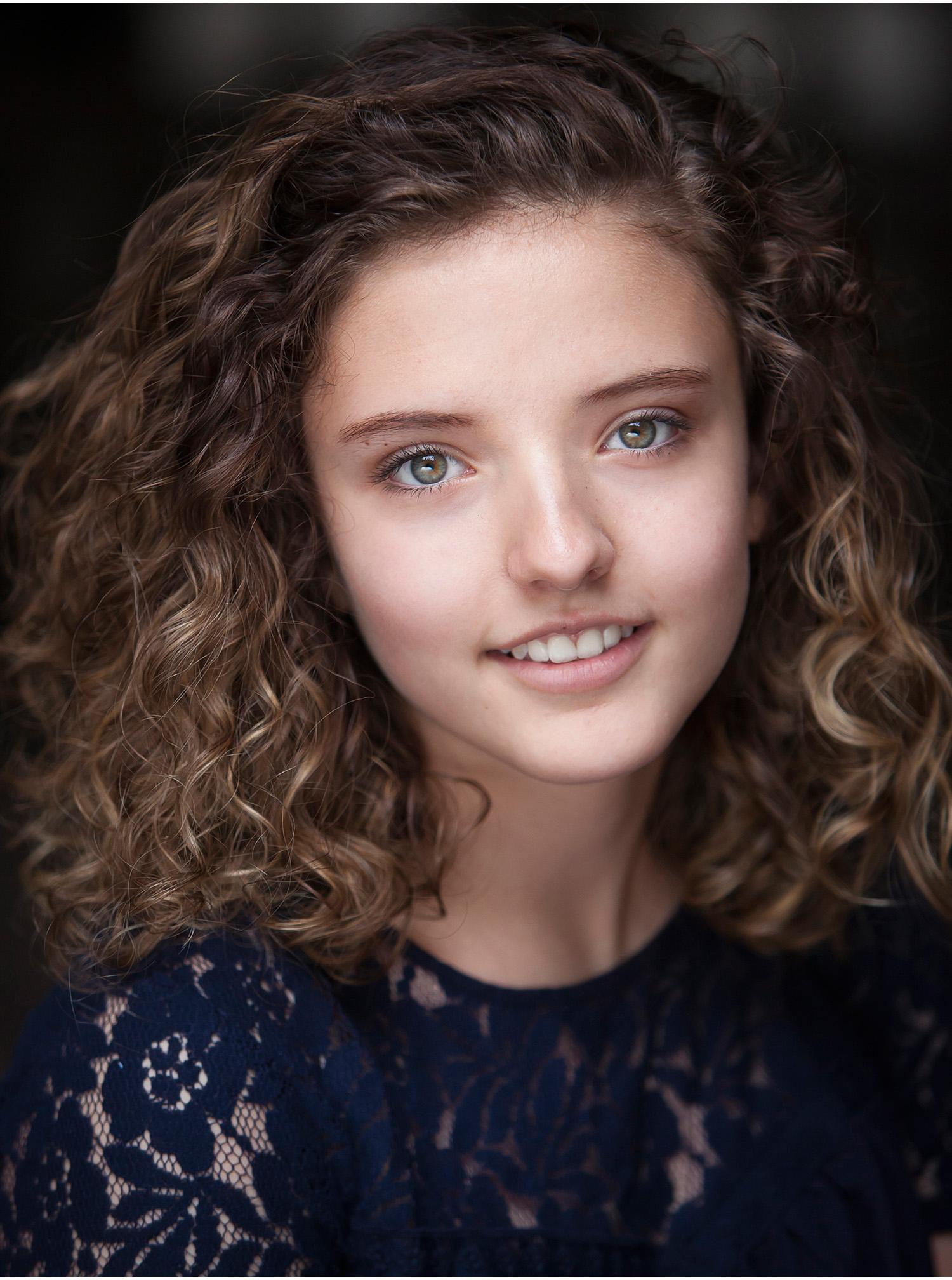 Young woman's actor headshots in downtown Denver with photographer Jennifer Koskinen, Merritt Portrait Studio