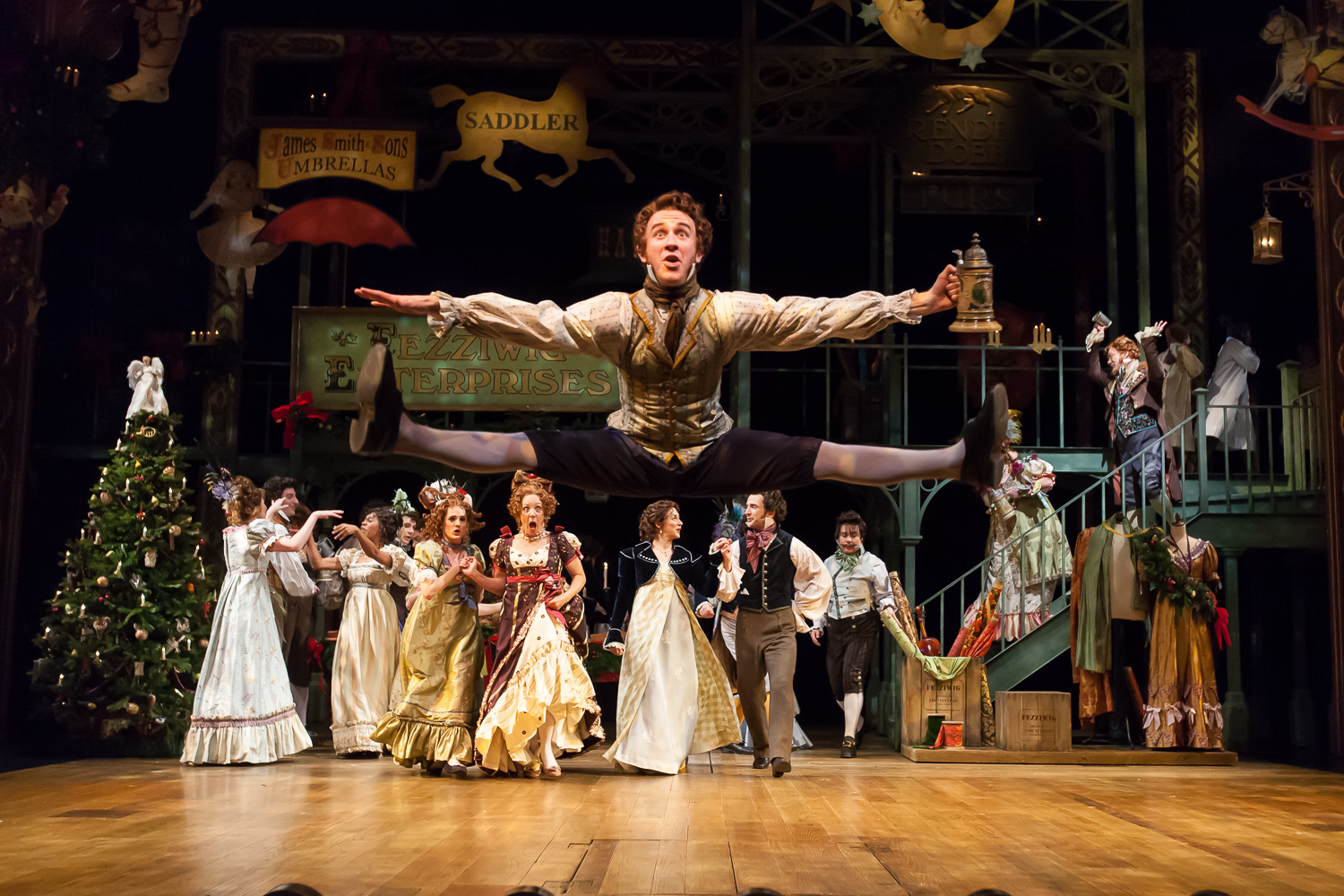 One of my all time favorite photos! All credit for this amazing capture goes to my assistant, who was 14 years old at the time, and a former cast member of this production at the Denver Center Theatre Company. Allen Dorsey, above, captured mid-leap in the Fezziwig scene of A CHRISTMAS CAROL. Photo by Gabe Koskinen, Merritt Design Photo
