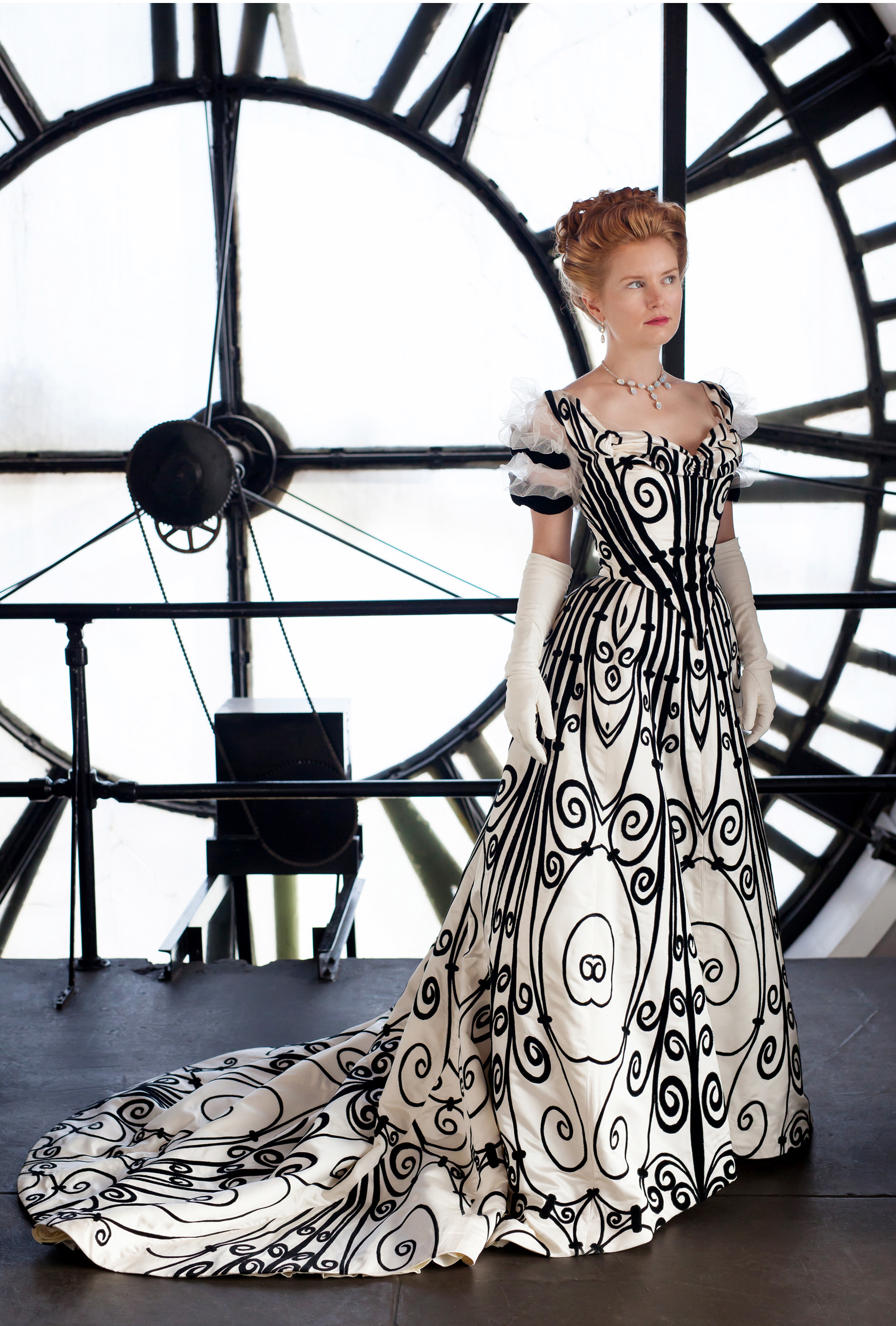 Cynthia Settje of Redthreaded models her Worth Gown photographed in Denver Clocktower by photographer Jennifer Koskinen, Merritt Portrait Studio