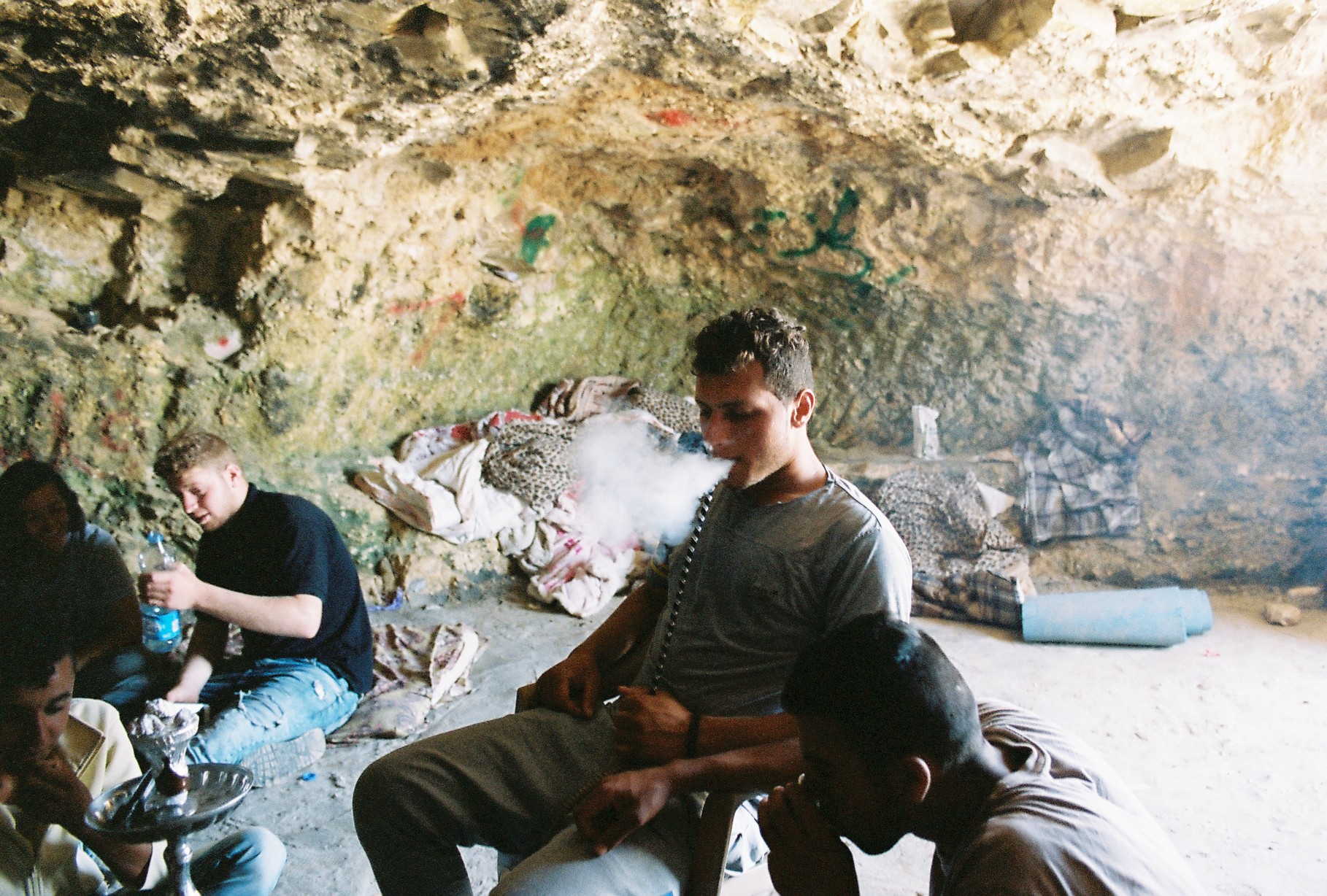 Salim, smoking nargileh in the cave, Nikon 35mm, Kodak Portra 400, copyright Sophie Schor