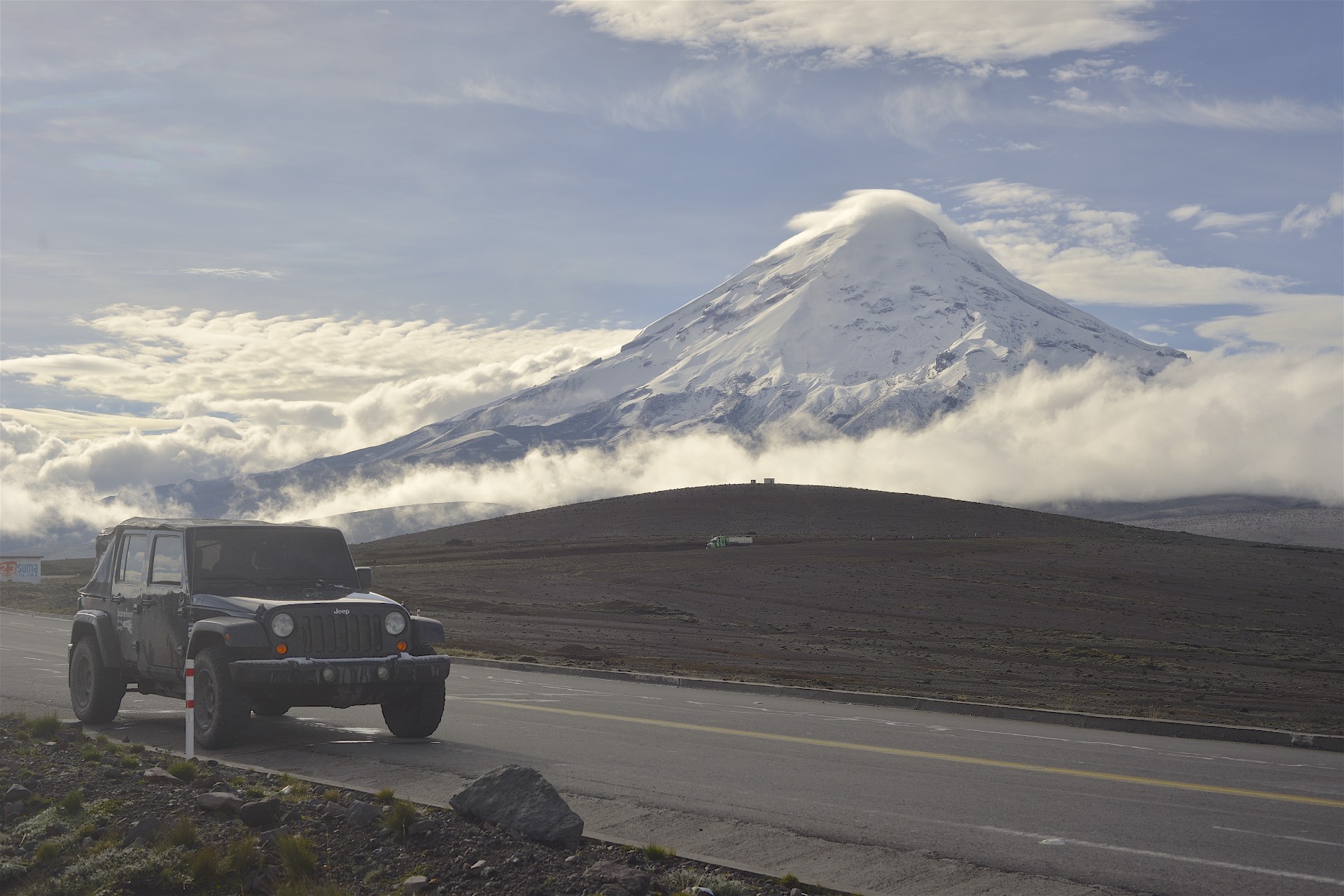 Chimborazo volcano behind the Jeep. 6300 meters.