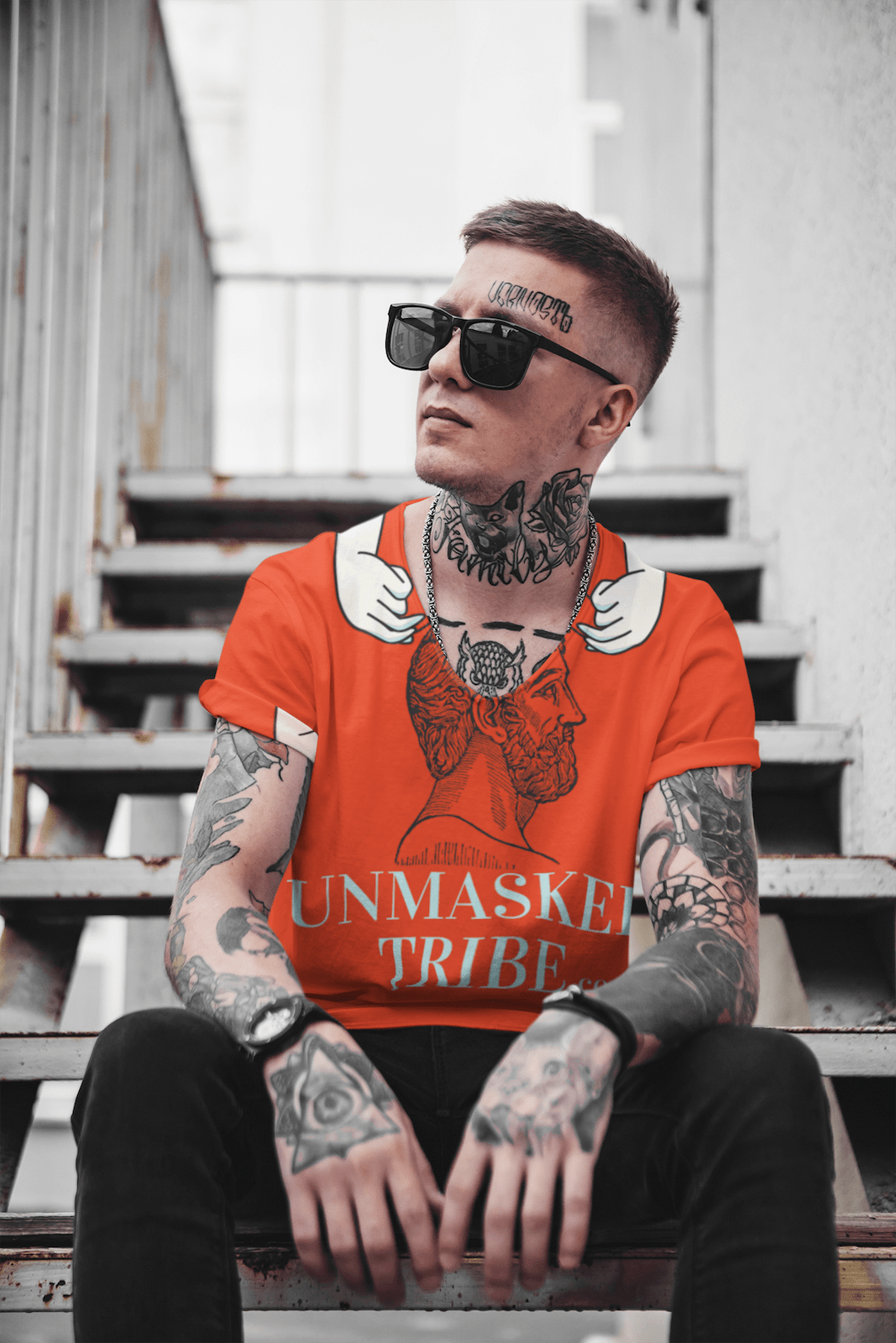 mockup-of-a-man-with-a-sublimated-v-neck-tee-sitting-on-the-stairs-35245-r-el2.png