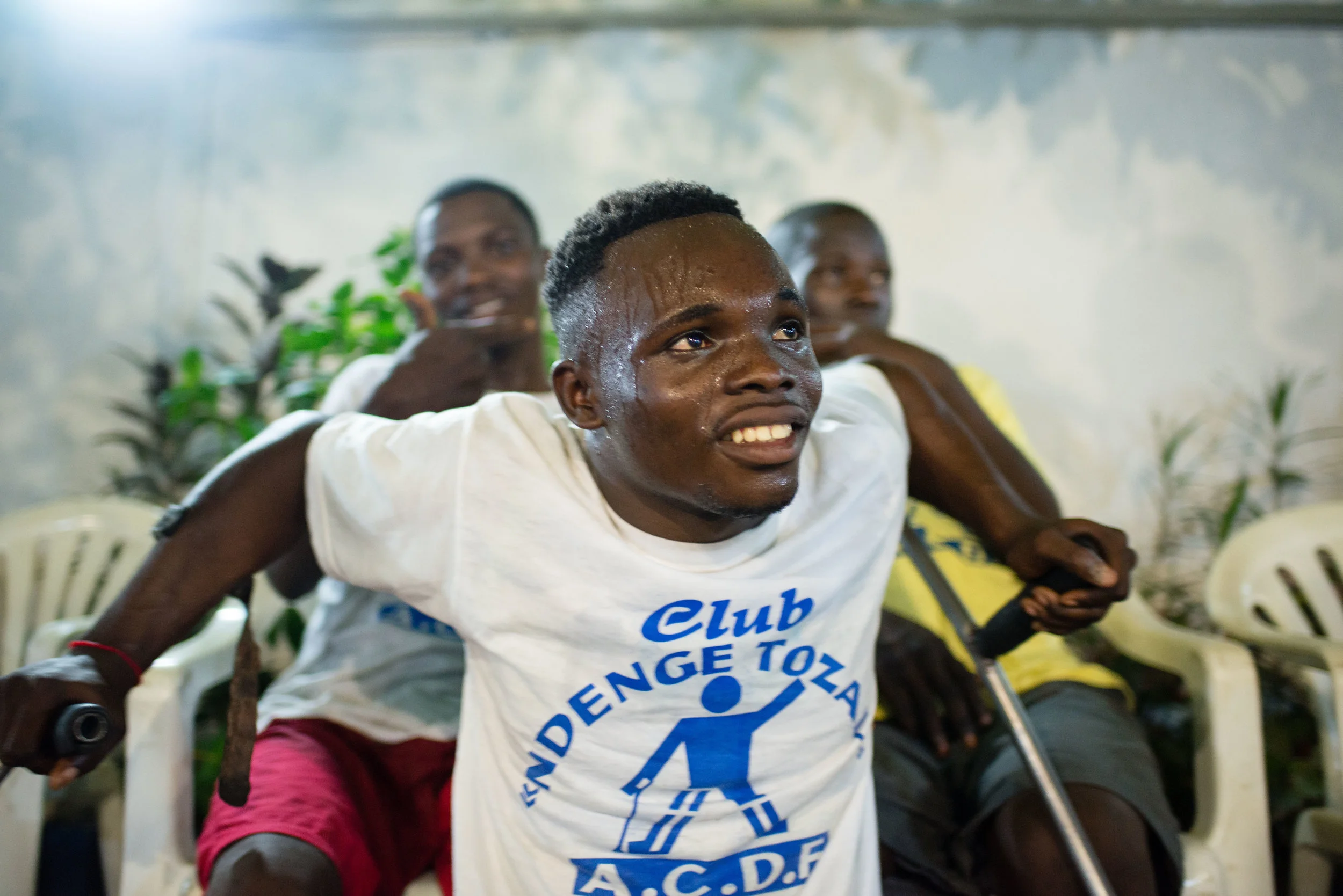  Madova catching his breath during a rare pause in dancing. The residential centre is safe space for children and youth with disabilities and many beneficiaries from years past come to hang out at weekends staying in touch with old friends and making