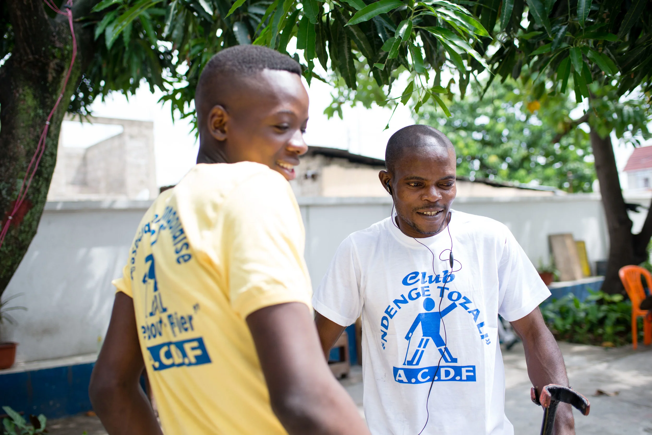  Matumona (r) is a brace technician in the on-site workshop where Gedeon (l) - who also studies at school - is training as an apprentice. 