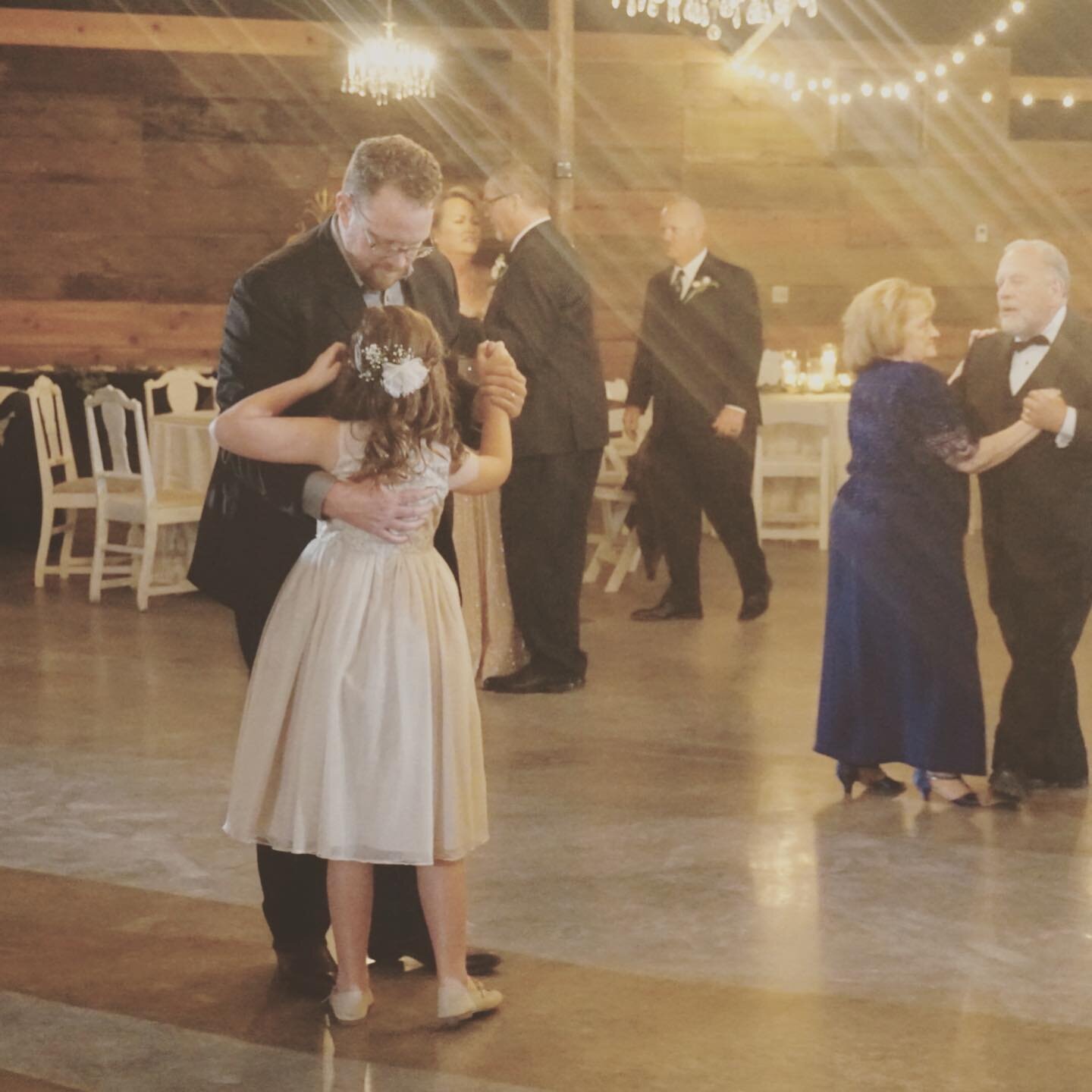 daddy daughter dancing at a wedding.