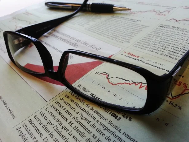glasses-and-pen-on-a-newspaper.jpg