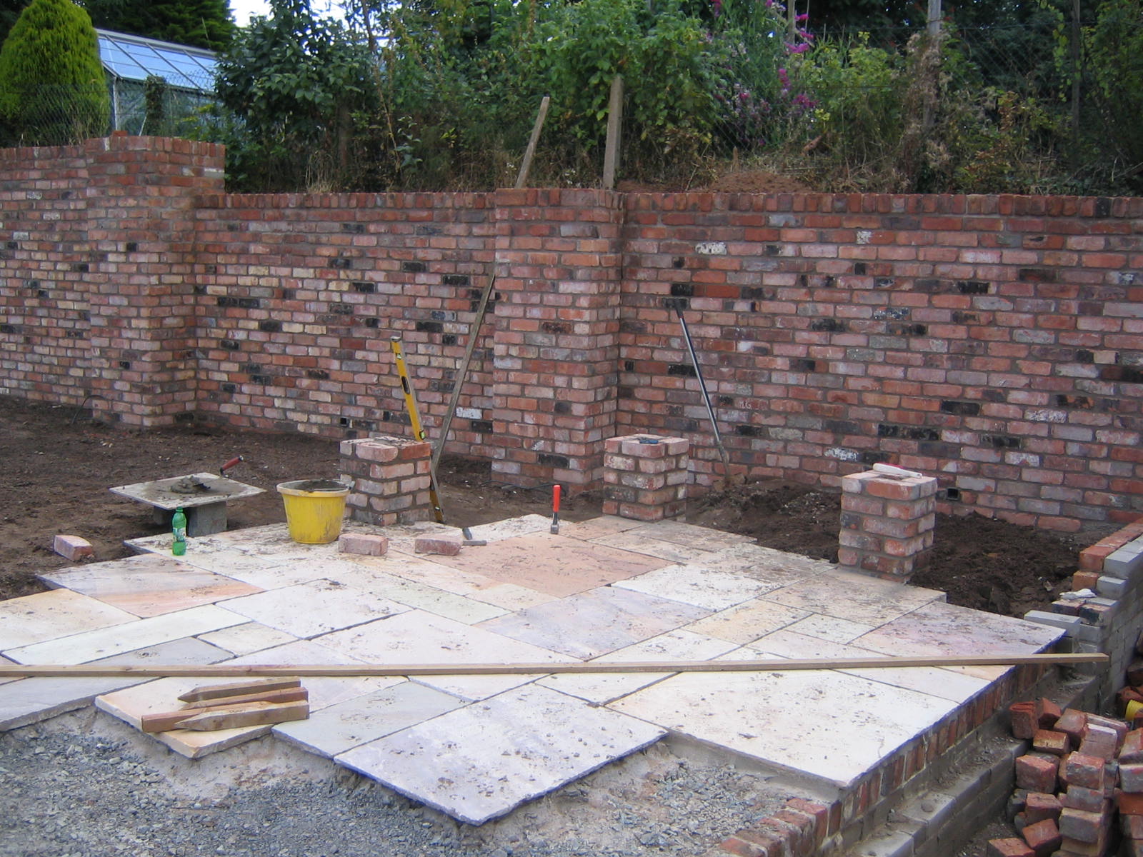 sandstone paving and reclaimed bricks in garden belfast