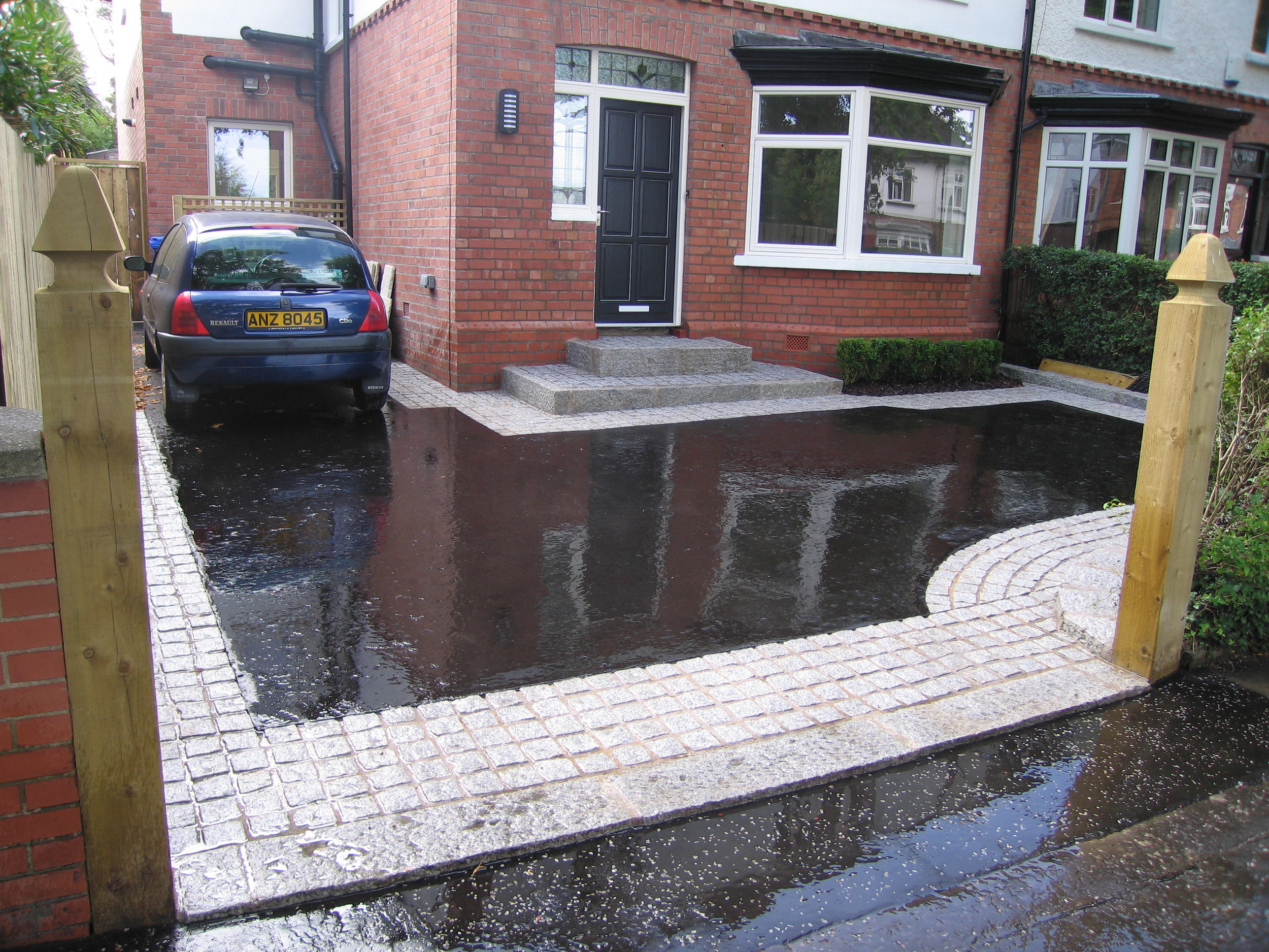 driveway construction with asphalt in Belfast