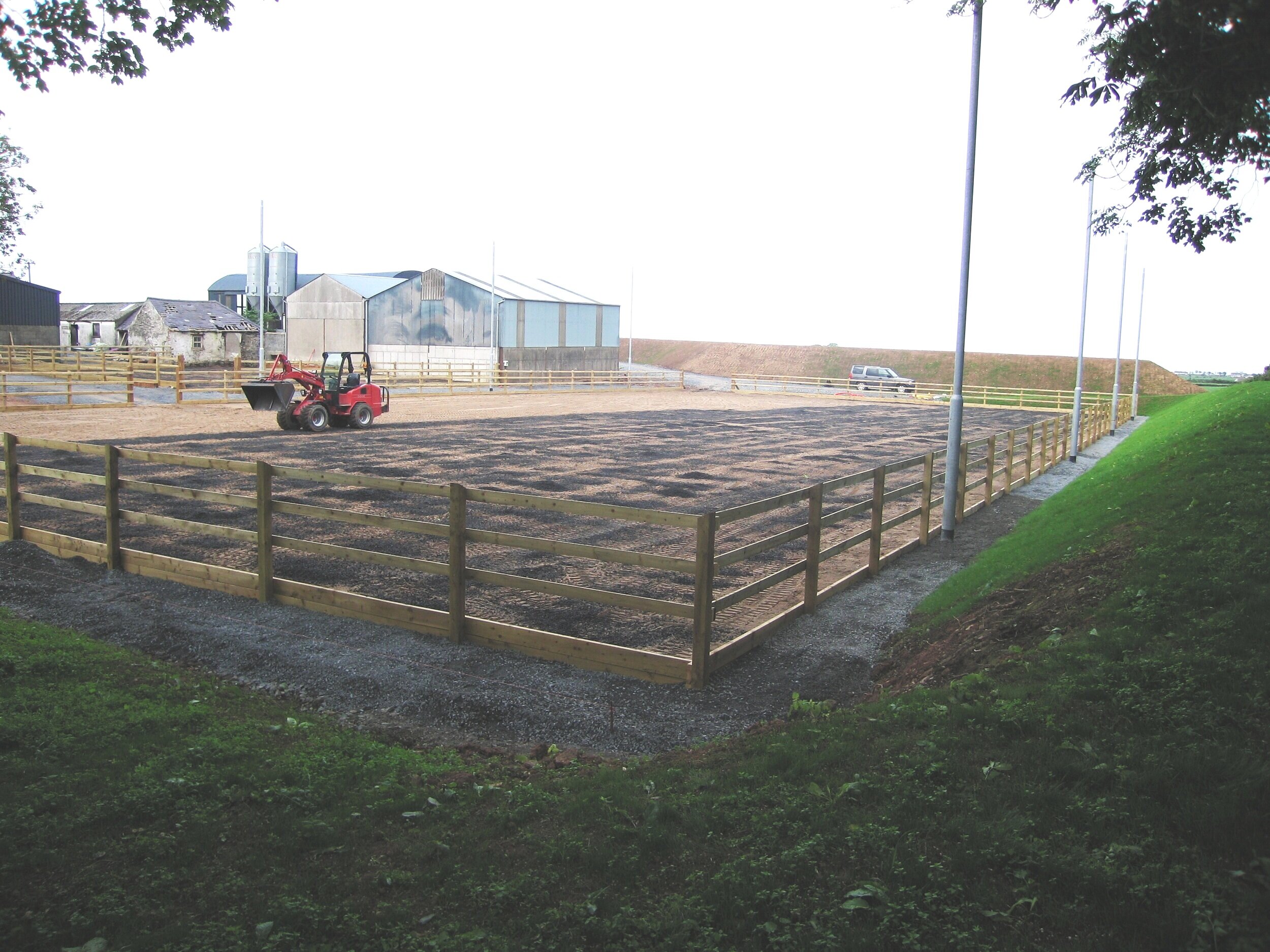 equestrian rubber for sandschool with fencing and landscaping uk dunnlandscapes