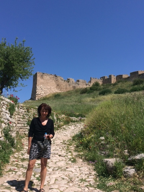 Leslie in Corinth cobbled path.jpeg