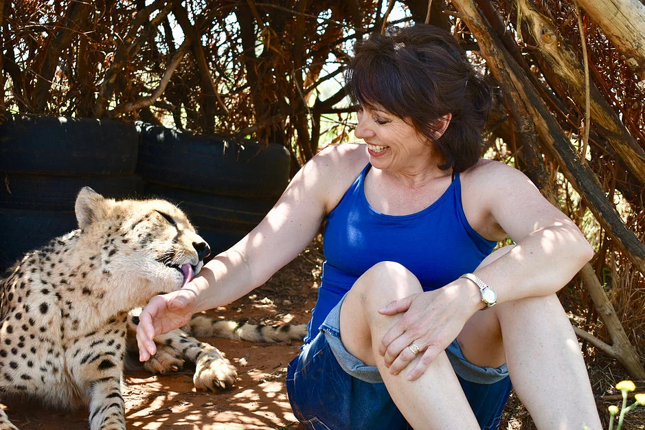 Leslie licked by cheetah.jpg